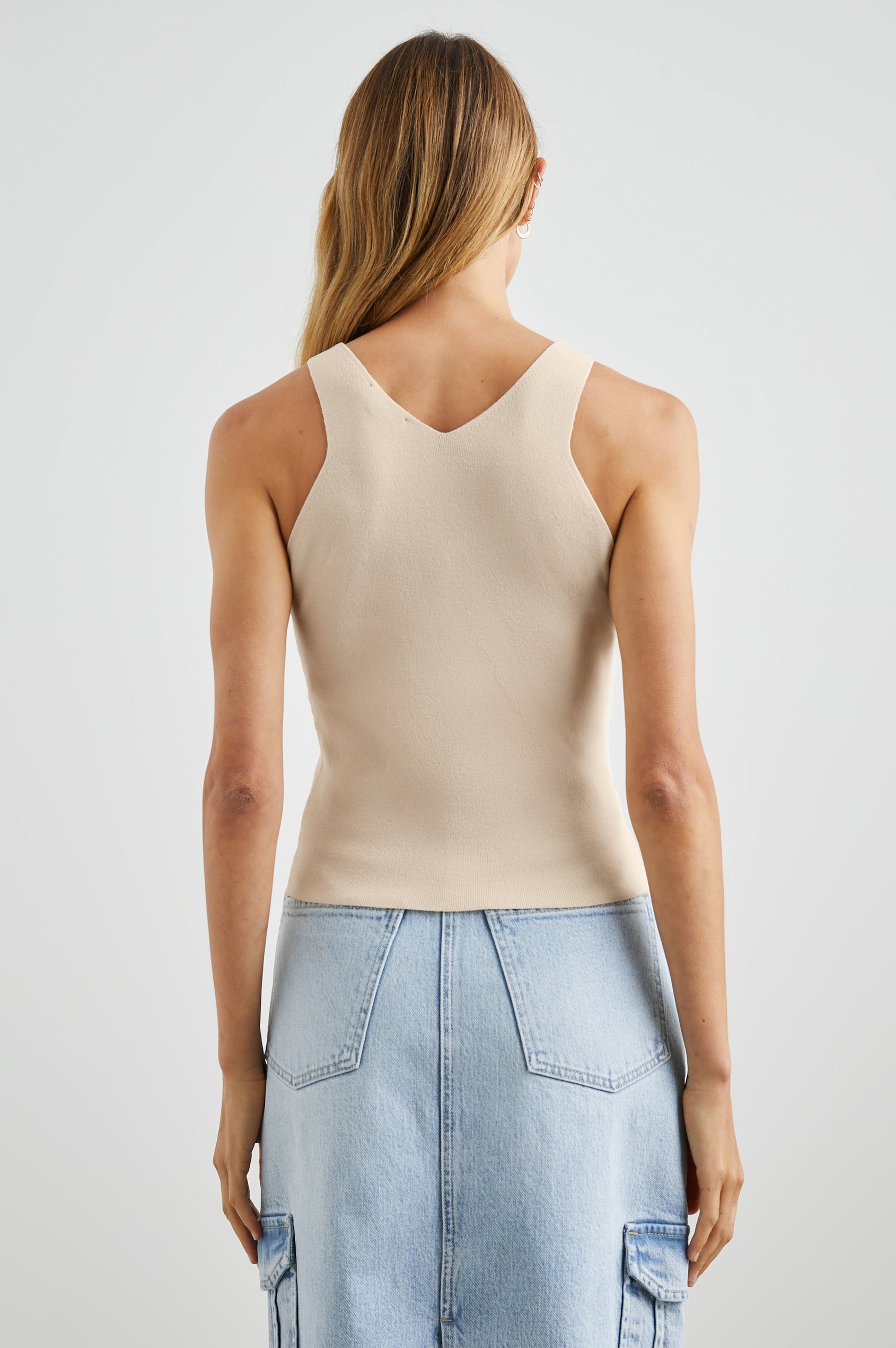Ally Tank with a High V Neck in Ivory Colorway - Back View Featured on Model 