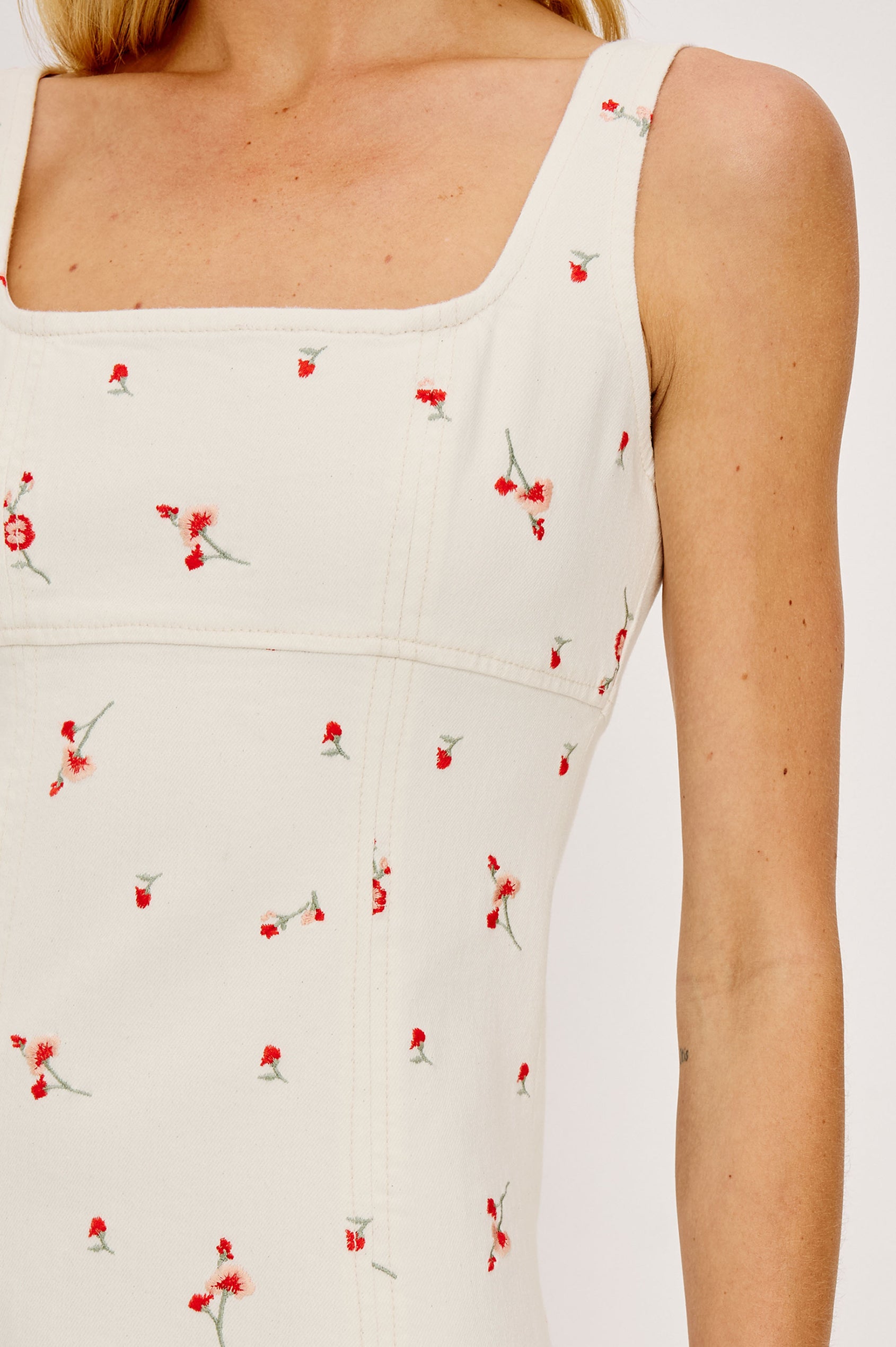 Altadena Mini Dress in Light Stretch Denim With Sleeveless Square Neckline and Back Zip Closure in Ecru Romantic Floral Colorway - Upper Body Front Close Up View Featured on Model