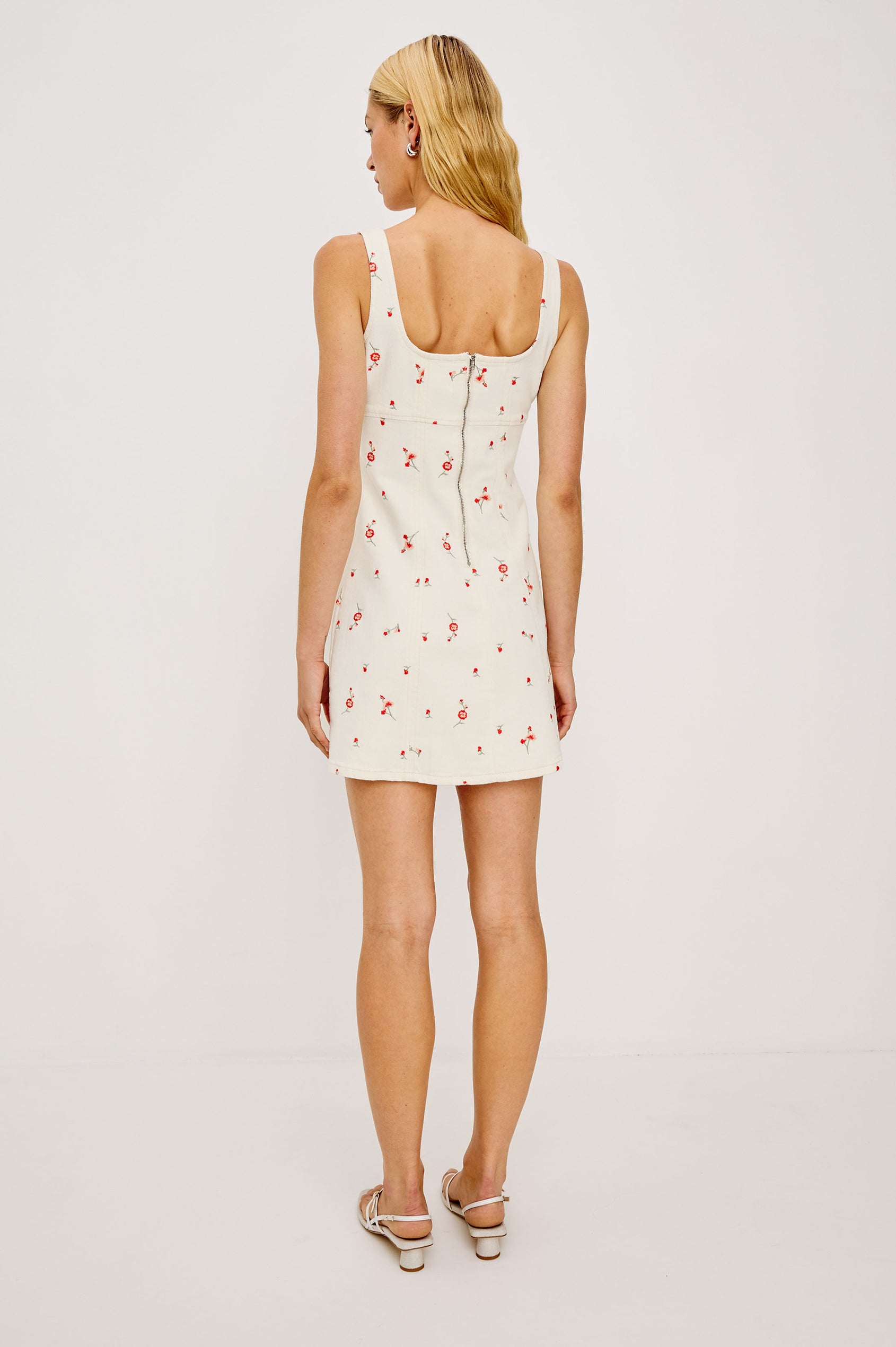 Altadena Mini Dress in Light Stretch Denim With Sleeveless Square Neckline and Back Zip Closure in Ecru Romantic Floral Colorway - Full Body Back View Featured on Model