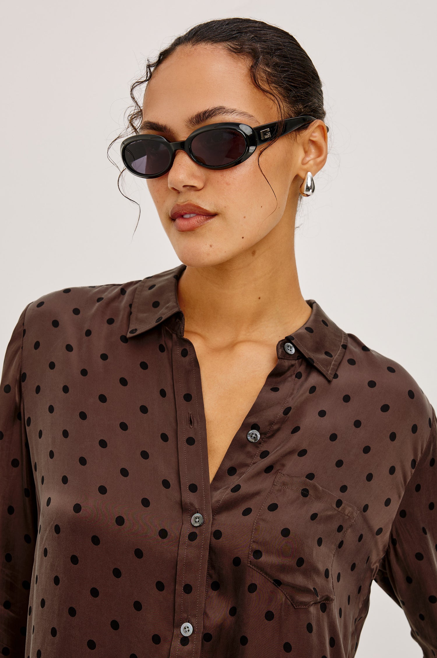 Alyssa Shirt in Luxe Lightweight Cupro With Loose Fit, Collar, Front Buttons, Long Sleeves, and Curved Back Hem in Olive Jaguar Colorway - Upper Body Front View Featured on Model
