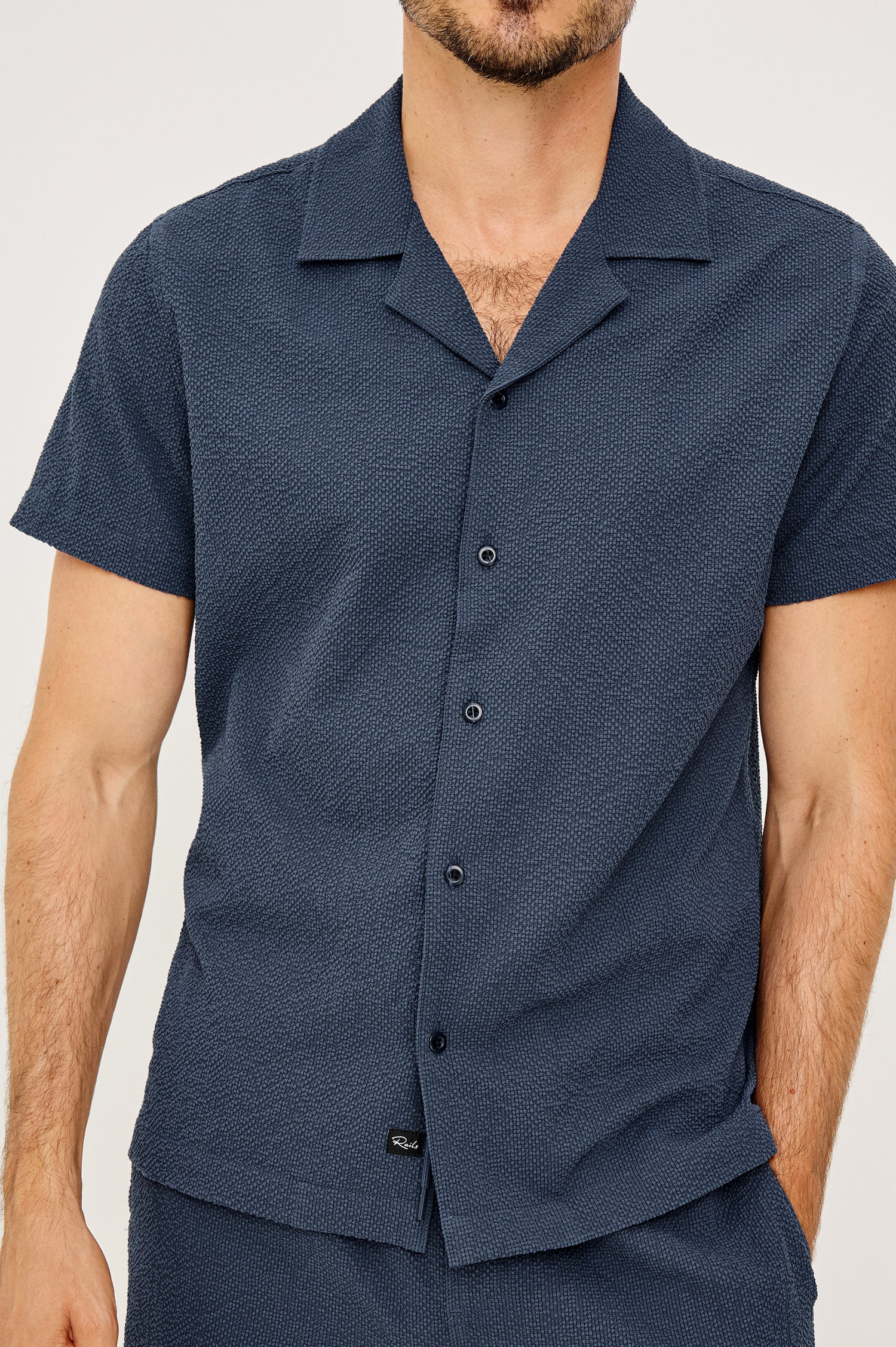 Amalfi Camp Shirt in Lightweight Seersucker With Notched Collar, Front Buttons, Short Sleeves, and Relaxed Fit in Stratios Colorway - Upper Body Front View Featured on Model