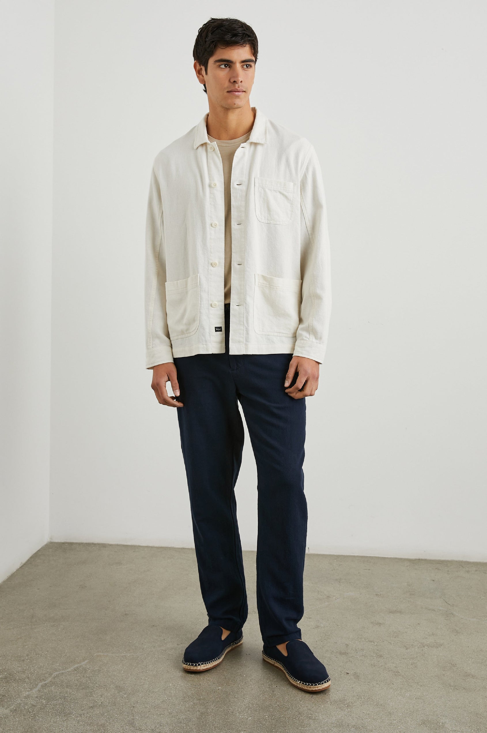 Ambrose Jacket with Button Closure and Two Front Patch Pockets and a Chest Patch Pocket in Ecru Colorway - Front Full Body View Featured on Model