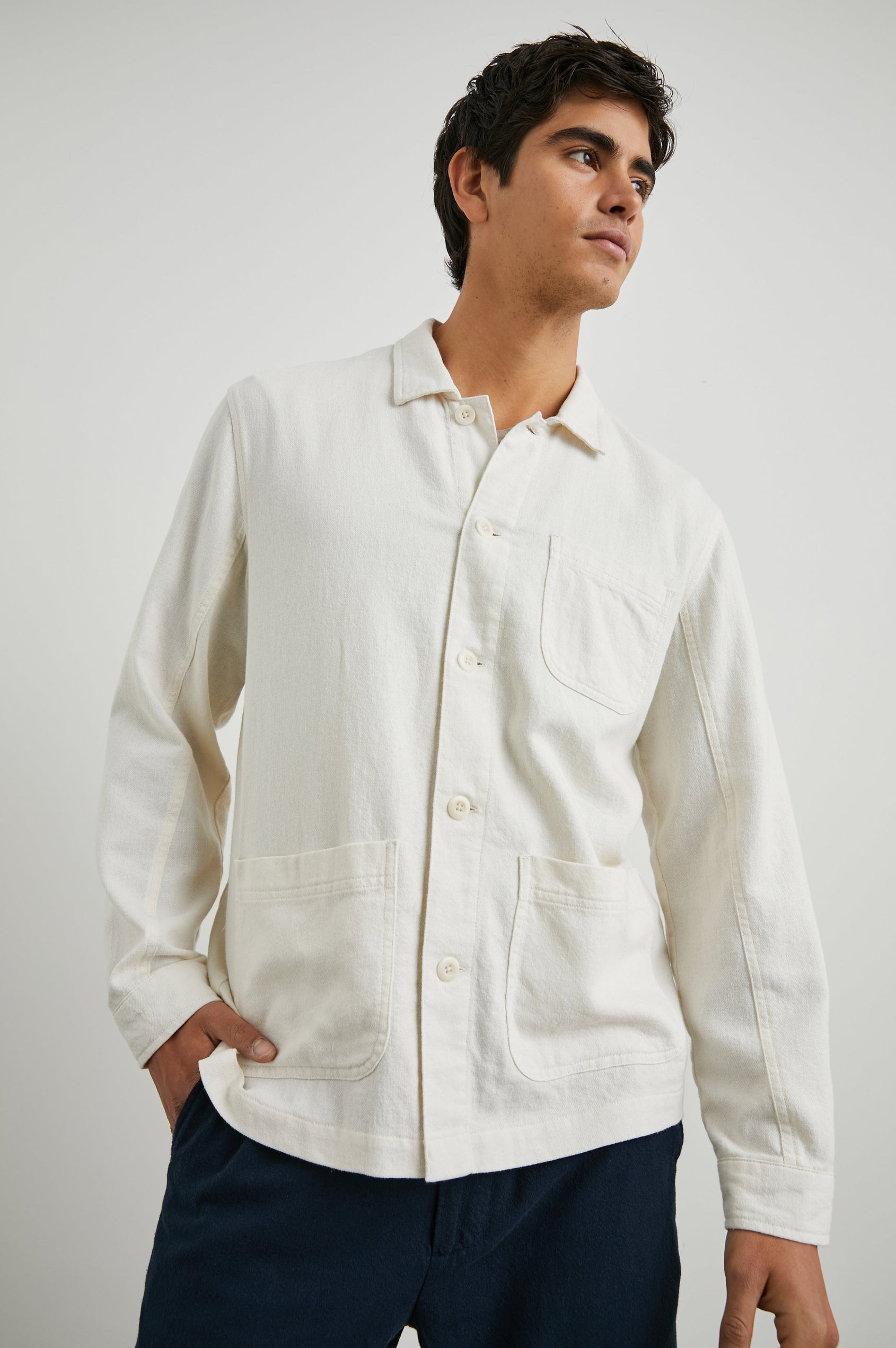 Ambrose Jacket with Button Closure and Two Front Patch Pockets and a Chest Patch Pocket in Ecru Colorway - Front View Featured on Model