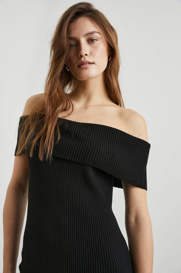 Anaya Ribbed Midi Dress with Off the Shoulder Short Sleeves in Black Colorway - Front View Featured on Model 