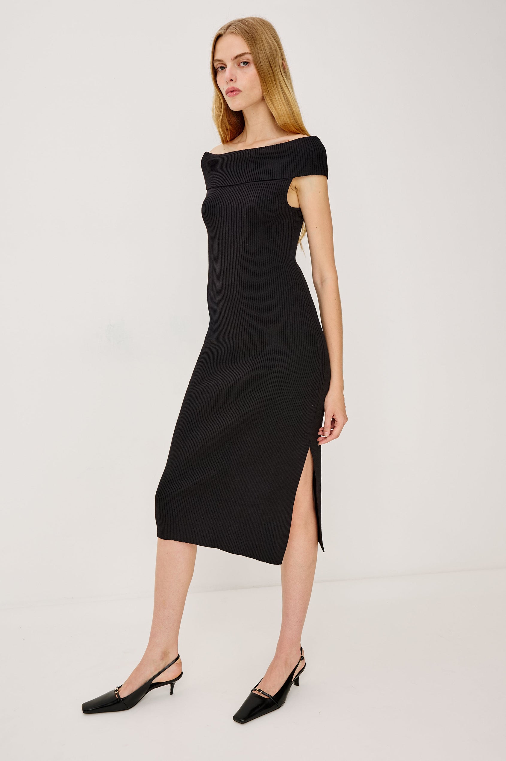 Anaya Ribbed Midi Dress with Off the Shoulder Short Sleeves in Black Colorway - Side Full Body View Featured on Model 