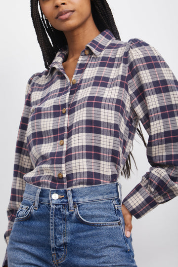 Angelica Long-Sleeve Denim Button Up with Shirring at Cuffs and Puff Sleeves in Almond Pink Navy Colorway, a Plaid - Front Tucked View Featured on Model