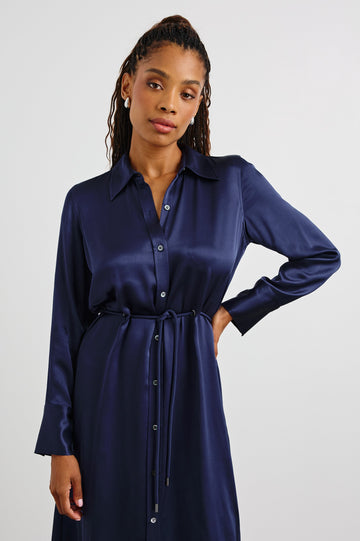 Anina Long-Sleeve Midi Dress with Buttons Down the Front, a Collar, Button Cuffs, and a Cord Belt in Navy Colorway - Front View Featured on Model