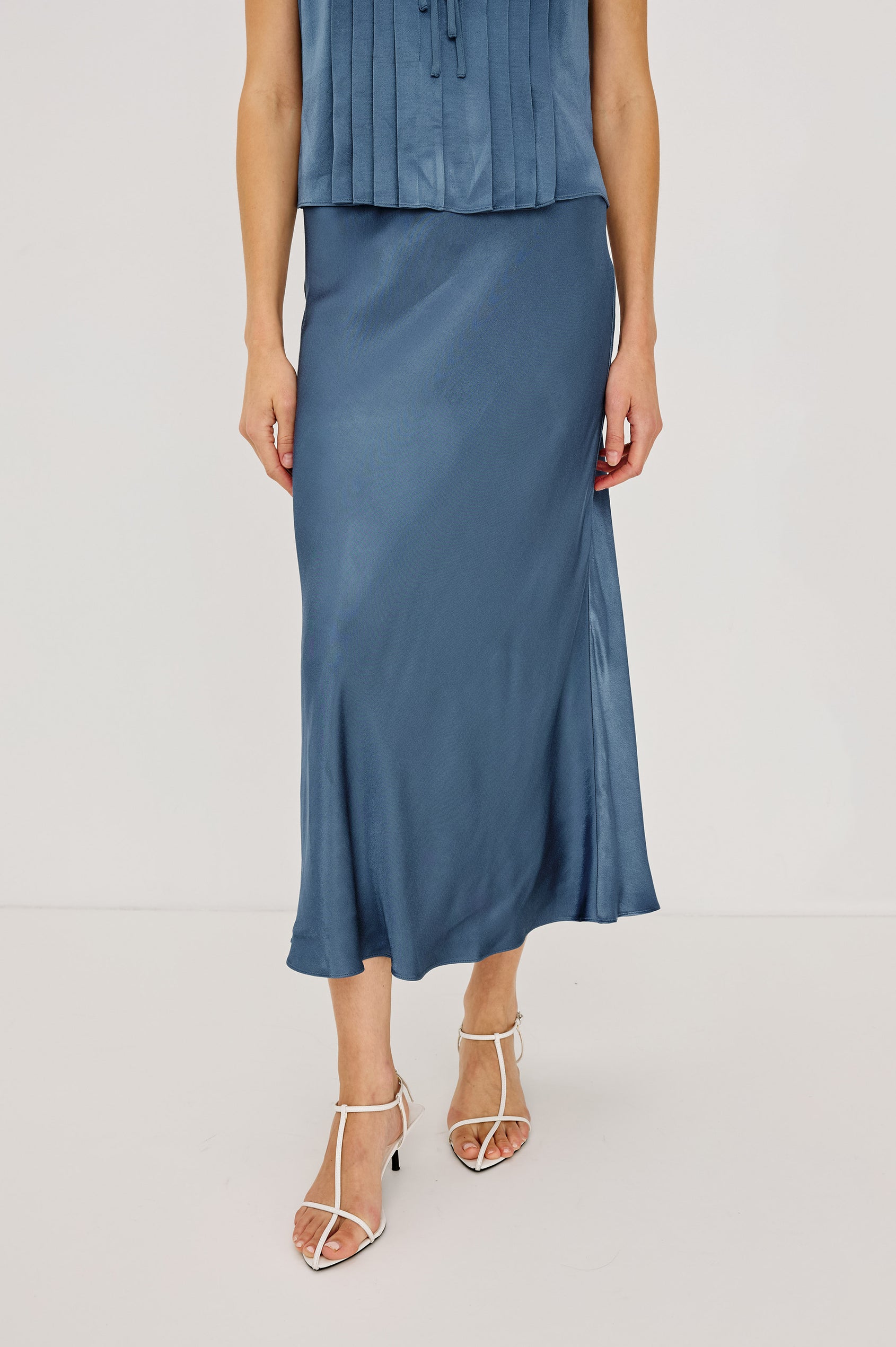 Anya Midi Skirt in Satin-Back Crepe, High-Rise Elastic Waistband, Pull-On FIt in Atlantic Colorway - Lower Body Front View Featured on Model