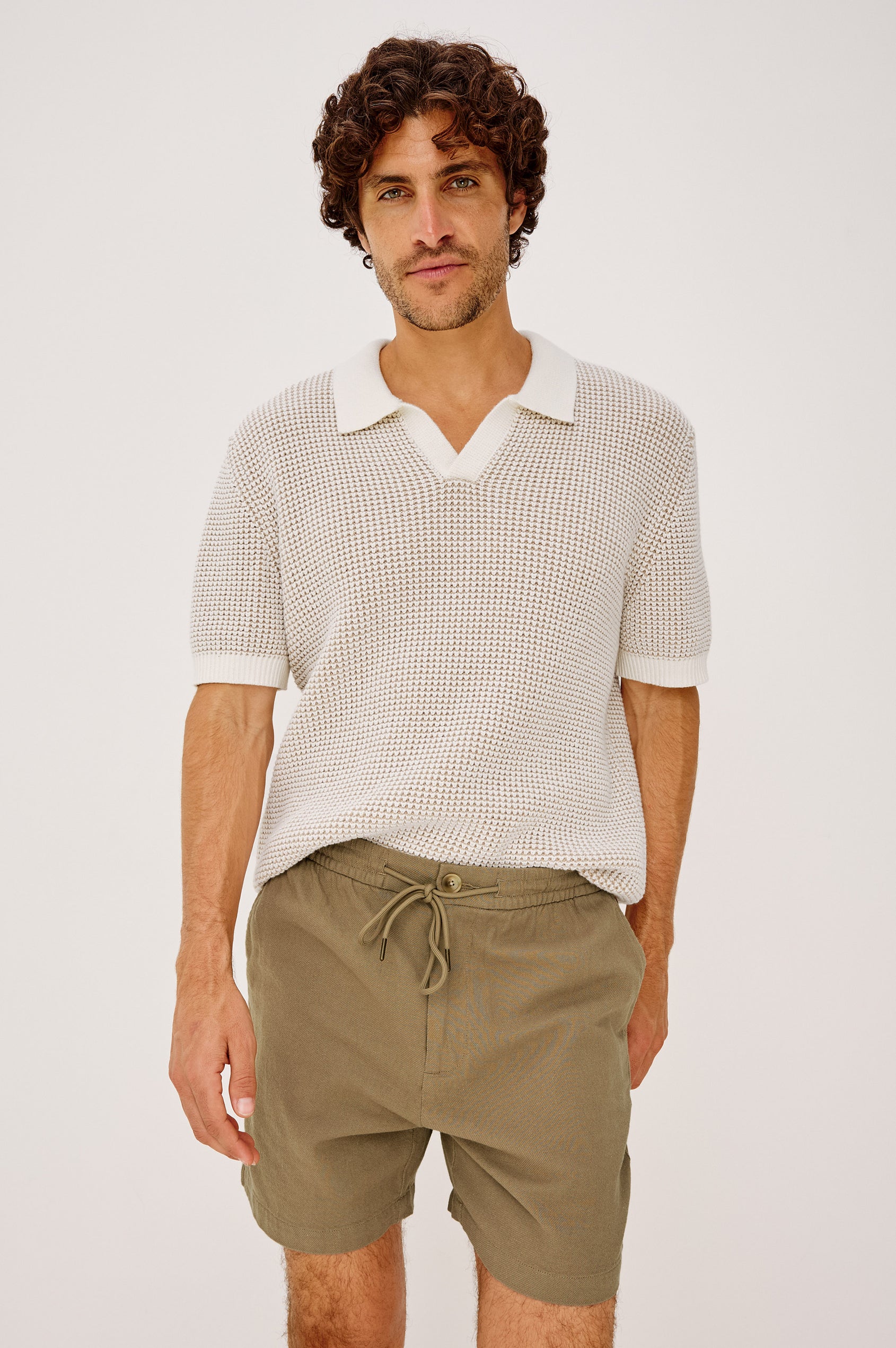 Archer Short in Heavy Linen With Relaxed Fit, Elastic Drawstring Waist, Front Zip Fly, 6″ Inseam, and Side Pockets in Barley Colorway - Upper Body Front View Featured on Model