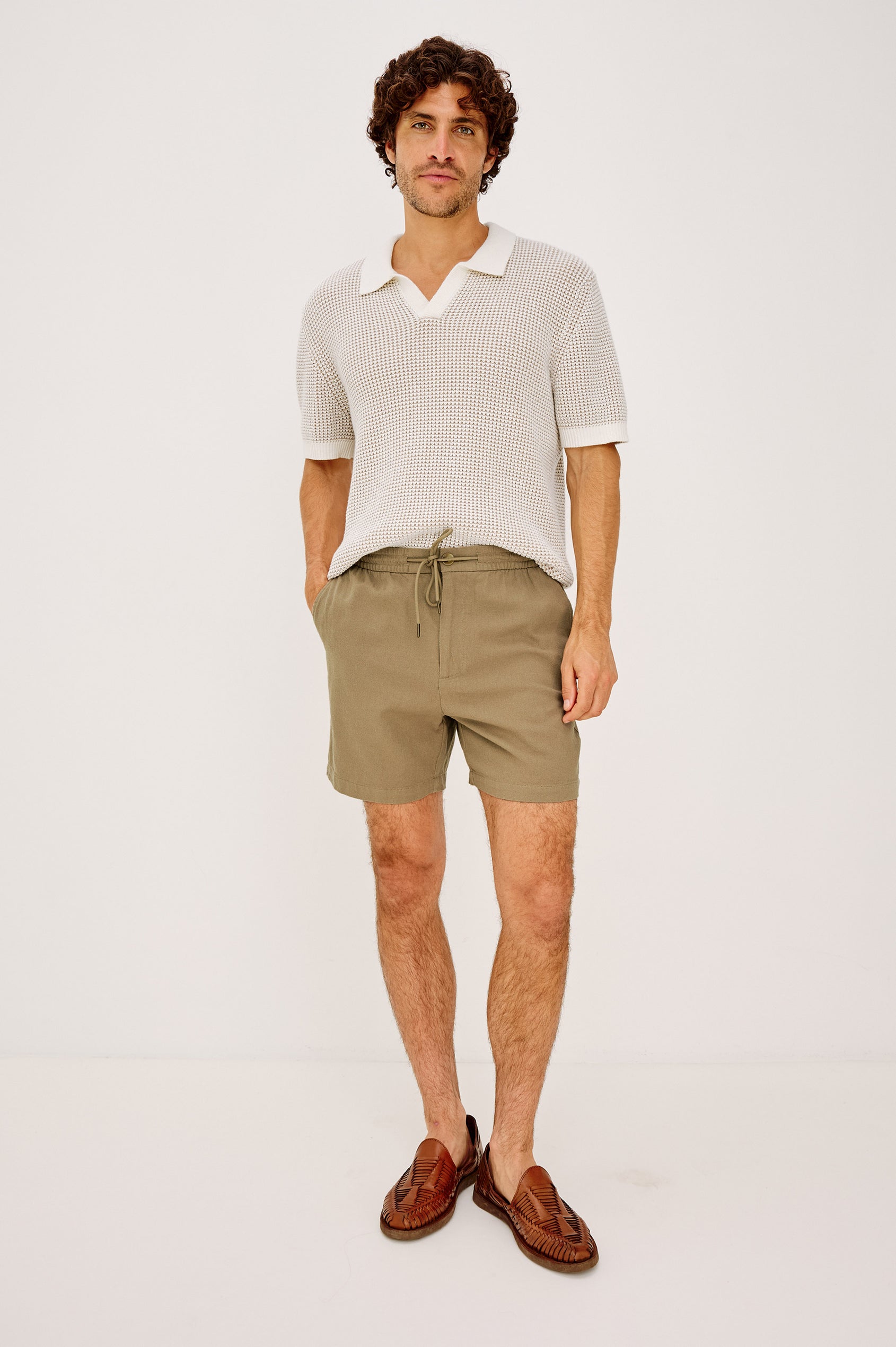 Archer Short in Heavy Linen With Relaxed Fit, Elastic Drawstring Waist, Front Zip Fly, 6″ Inseam, and Side Pockets in Barley Colorway - Full Body Front View Featured on Model