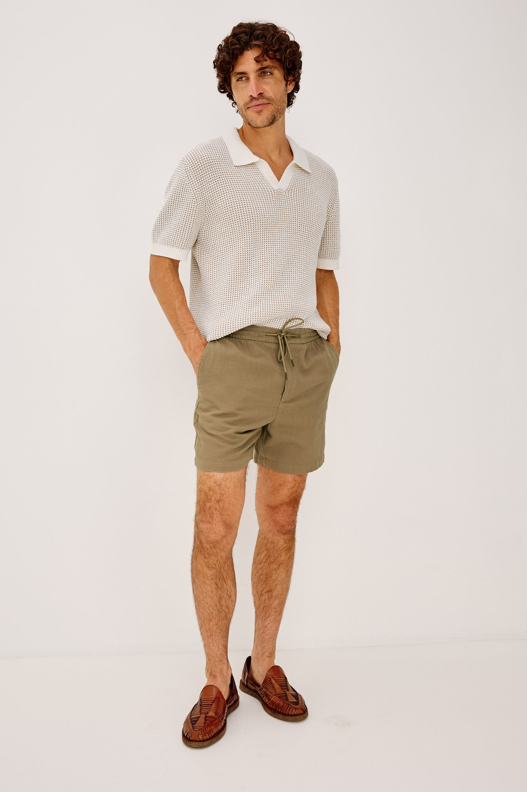 Archer Short in Heavy Linen With Relaxed Fit, Elastic Drawstring Waist, Front Zip Fly, 6″ Inseam, and Side Pockets in Barley Colorway - Full Body Front View Featured on Model
