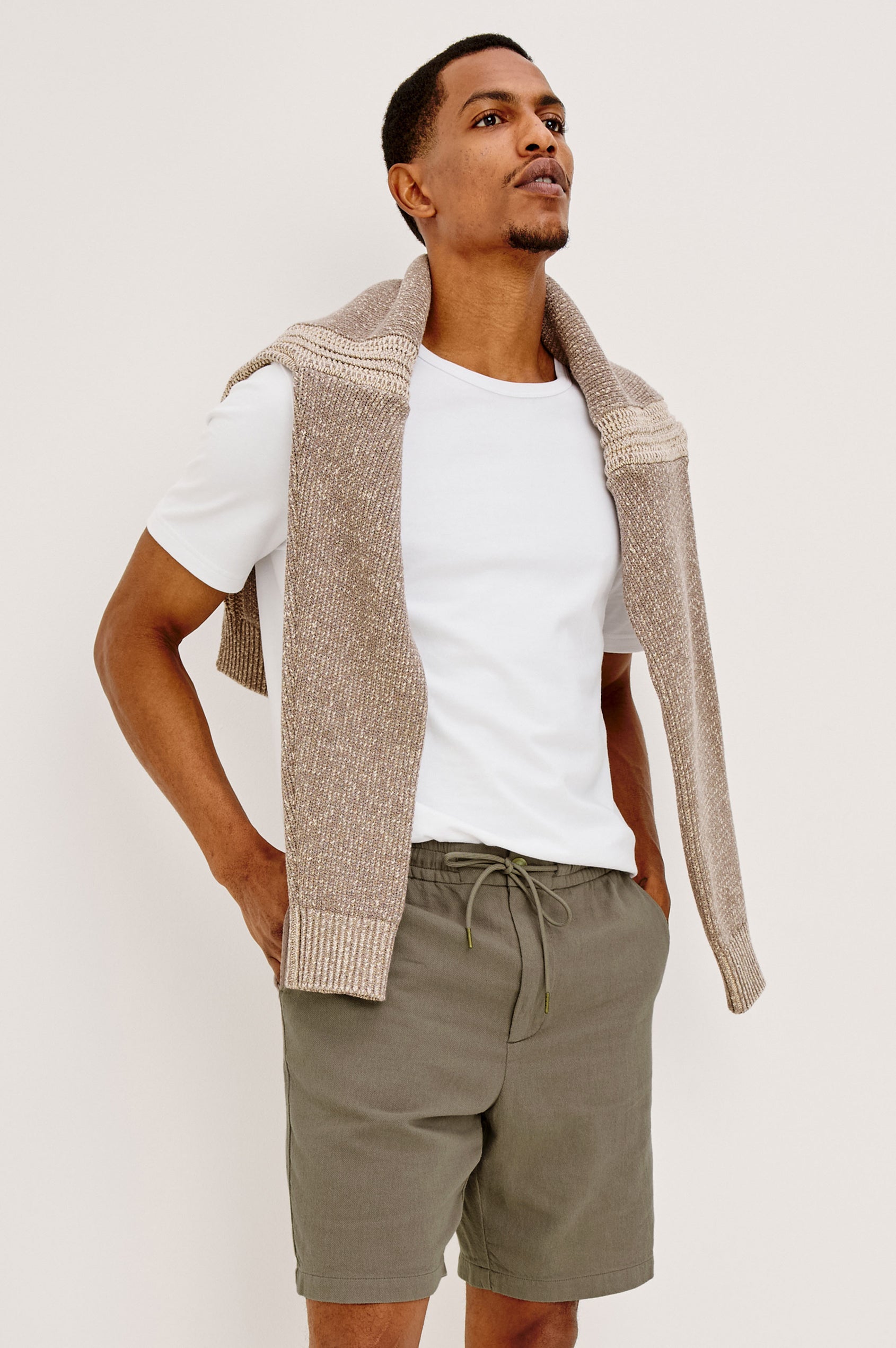 Archer Short in Unlined Cotton Linen With Relaxed Fit, Adjustable Waist Drawstring Ties, Side Pockts, and 8.5-Inch Inseam in Fallen Rock Colorway - Full Body Front View Featured on Model