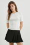 Ari Short-Sleeve Ribbed Top with a Crew Neck in White Colorway - Front View Featured on Model