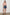 Arlene Top with Short Flutter Cap Sleeves, A V-Neckline and Shirring Along the Top Front in Salerno Stripe Colorway, Vertical Stripes in Sand and Salmon - Front Tucked Full Body View Featured on Model
