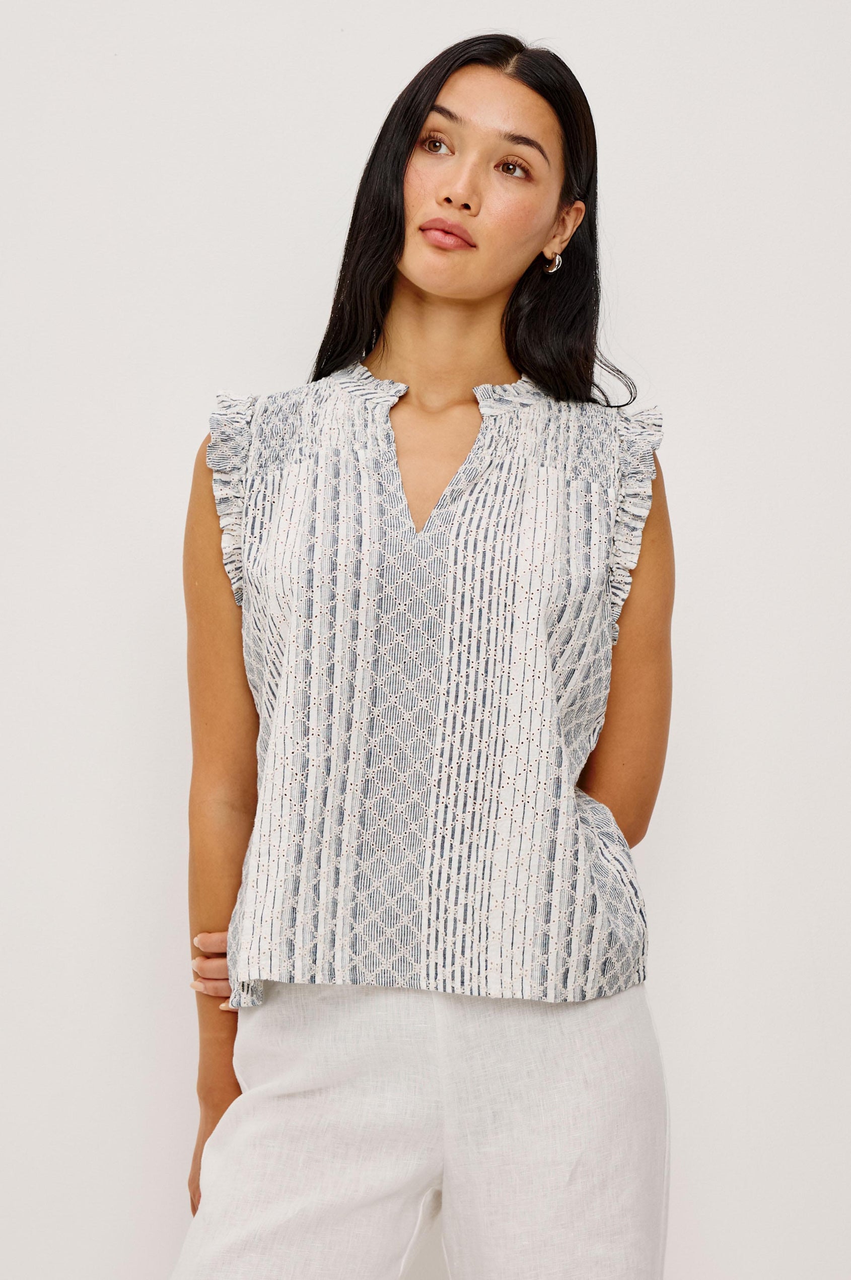 Arlene Sleeveless Top in Luxe Linen With V-Neckline, Pleated Collar, and Smocked Bodice in Striped Eyelet Colorway - Upper Body Front View Featured on Model