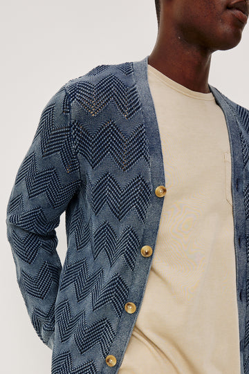 Ashe Cardigan Sweater in Jacquard Knit With Unique Spray-Wash Finish, Front Buttons, Regular Fit, and Long Sleeves in Sunfaded Navy Colorway - Upper Body Front Close Up View Featured on Model