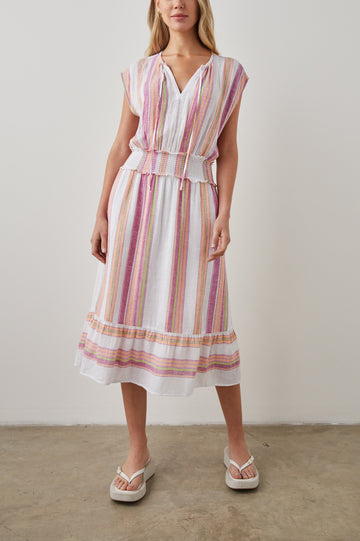 Ashlyn Short Sleeve Midi Dress with a V neck with Ties, a Smocked Waist and a Ruffle Tier at the Hem in Hibiscus Stripe Colorway, Vertical Stripes in Pink, Green and Peach on White - Front Full Body View Featured on Model