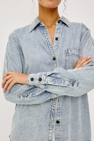 Atticus Long-Sleeve Denim Style Button Up with Chest Patch Pocket in Bleached Indigo Colorway - Upper Body Front View Zoomed In Details Featured on Model