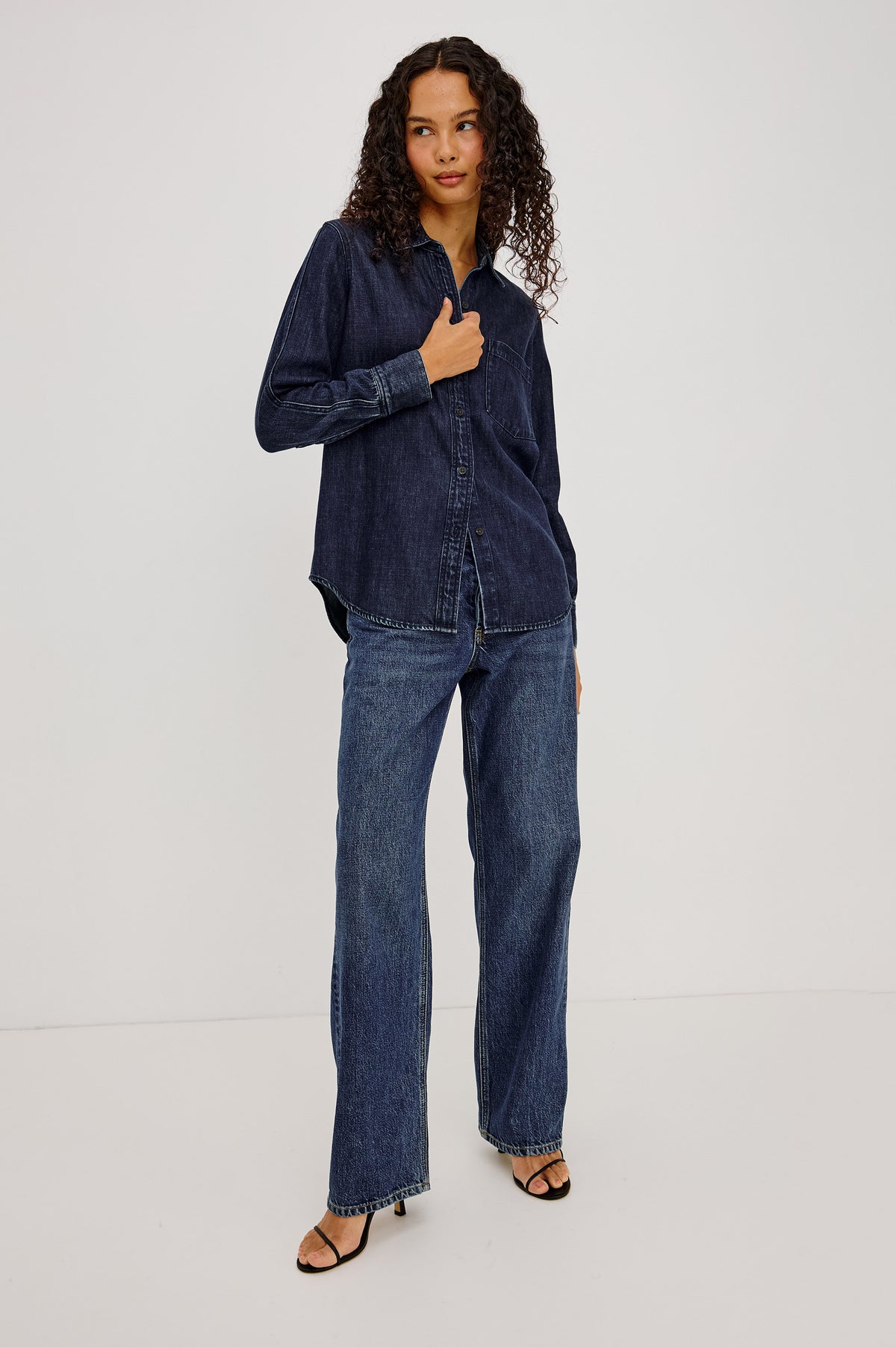 Atticus Shirt in TENCELâ„¢ Denim With Relaxed Fit, Point Collar, Front Button, and Long Sleeves With Flat-Felled Seams and Buttoned Cuffs in Blue Ridge Colorway - Full Body Front View Featured on Model