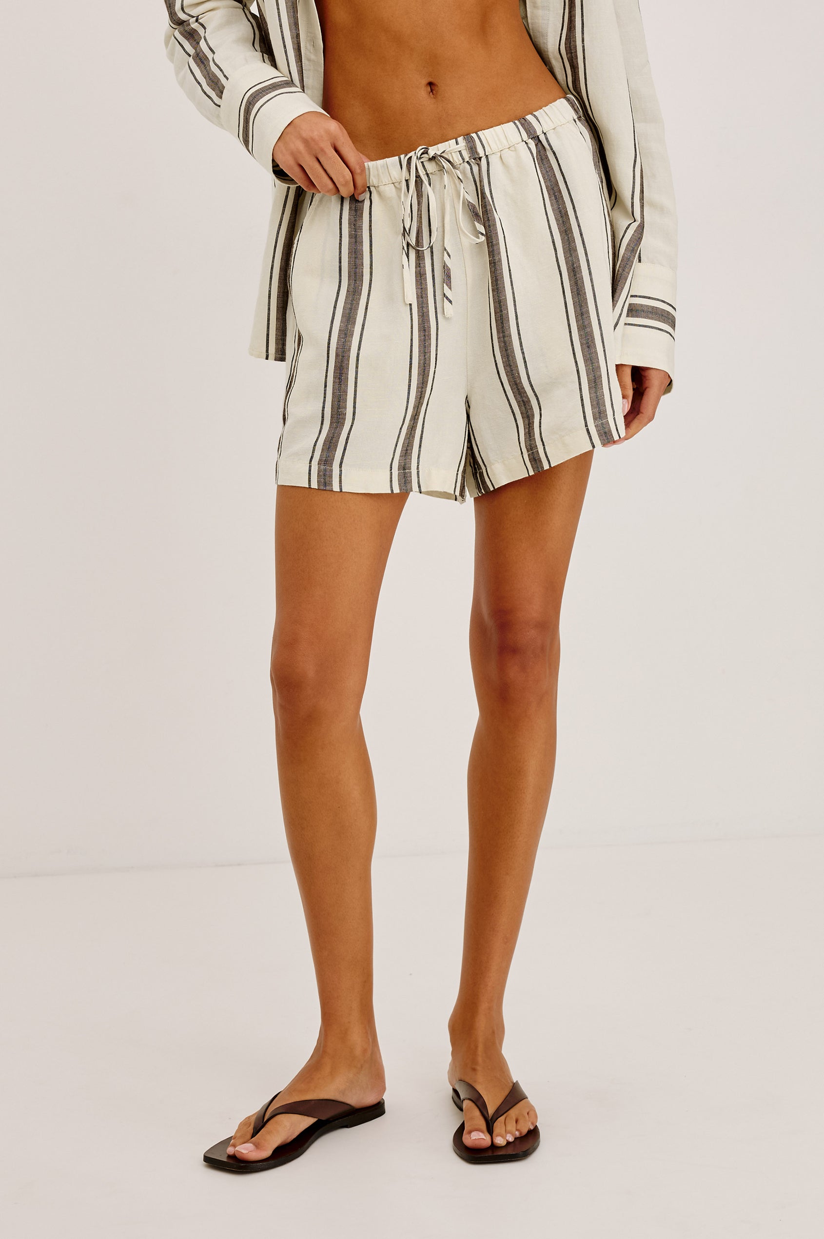 Knox Button-Up Shirt in Linen Viscose With Collar, Front Buttons, Long Sleeves, and Relaxed Fit in Sequoia Stripe Colorway - Upper Body Front View Featured on Model