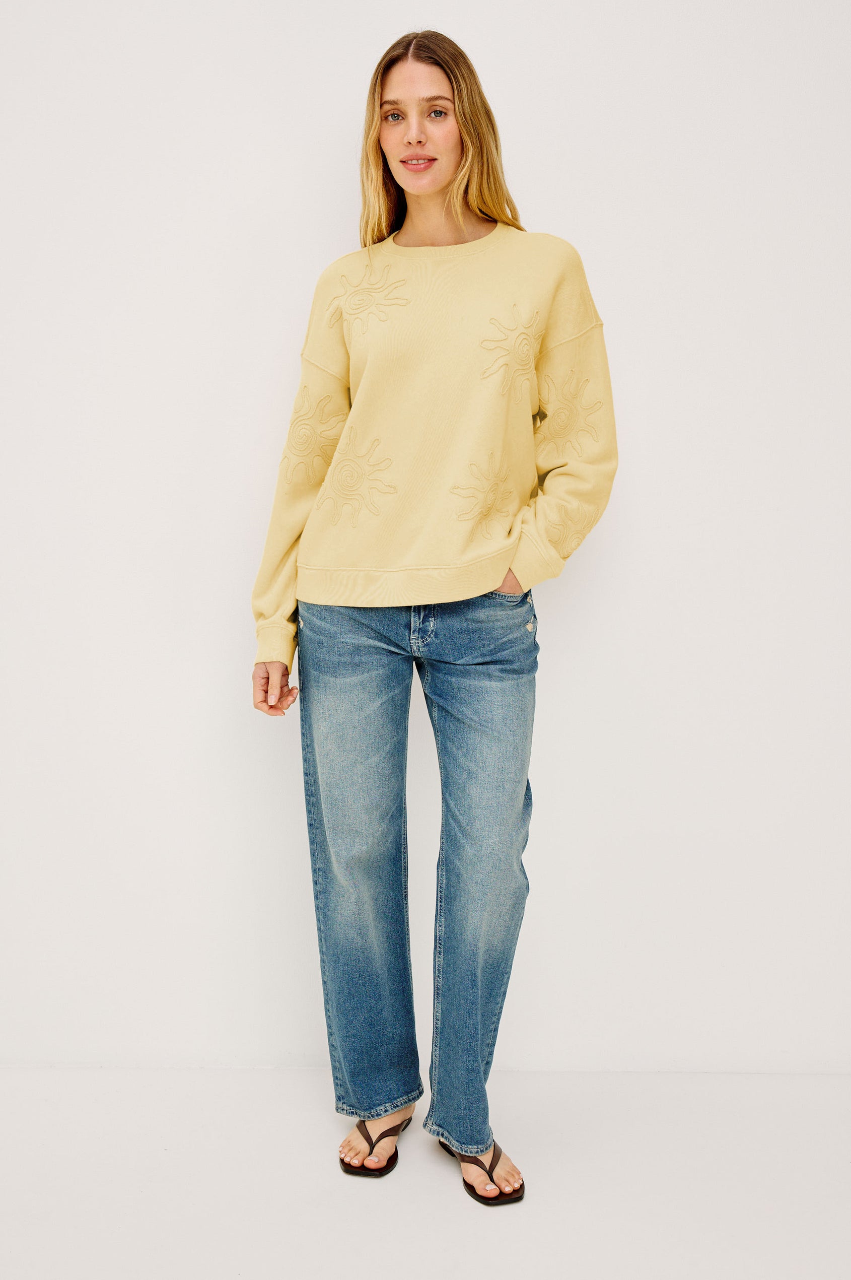 Beckley Sweatshirt in French Terry With Soutached Suns, Relaxed Fit, and Long Sleeves in Sunshine Colorway - Full Body Front View Featured on Model