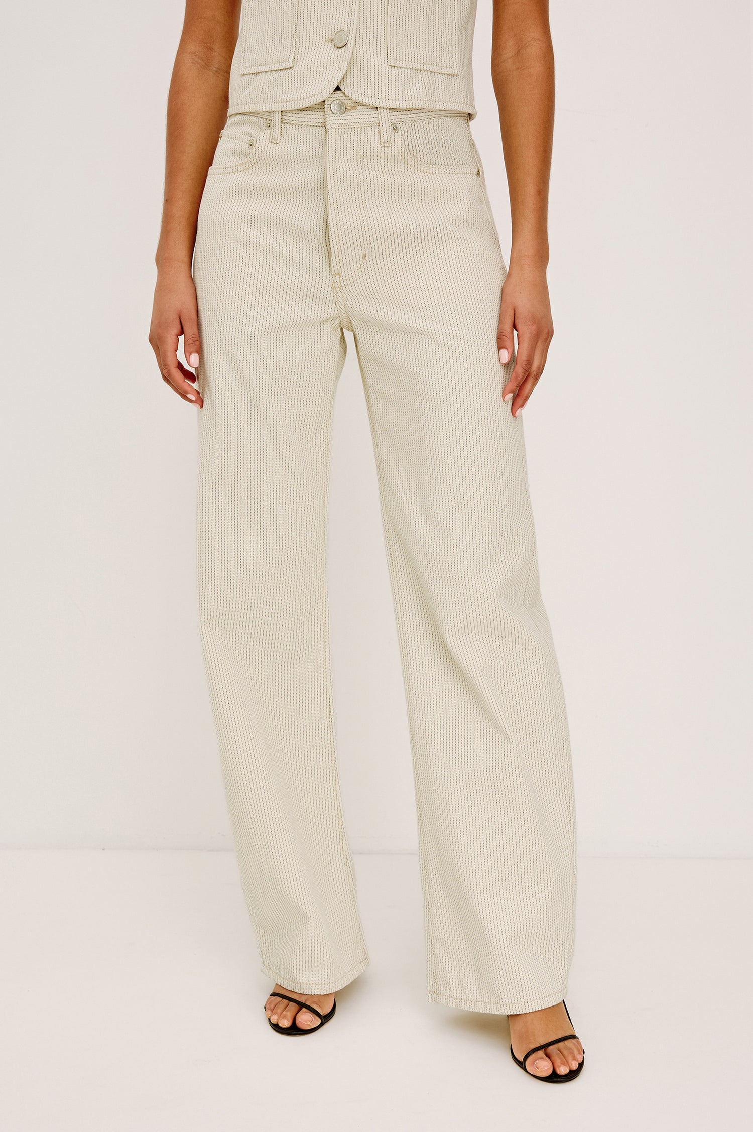 Belmont Arc Leg Jean in Rigid Denim With High-Waisted Fit, Button Fly, and 32″ Inseam in Ecru Railroad Stripe Colorway - Lower Body Front View Featured on Model