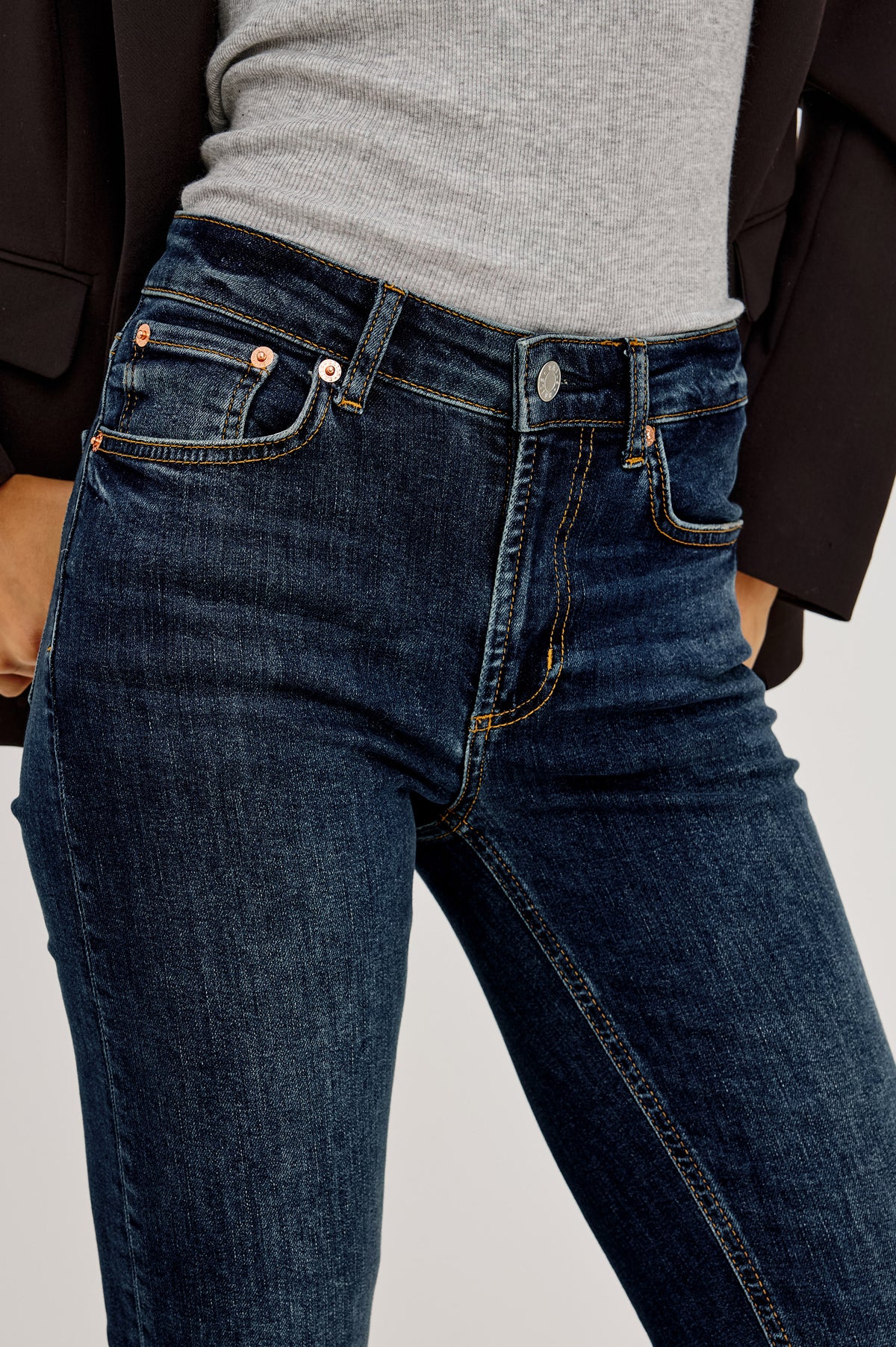 Bixby Mid-Rise Slim Straight Jean in High Stretch Denim With 28" Inseam, Zip Fly, and 5-Pockets in Deep Dive Colorway - Lower Body Back View Featured on Model