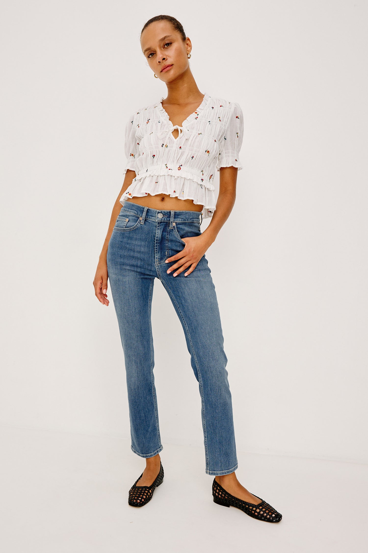 Bixby Mid-Rise Slim Straight Jean in High Stretch Denim With 25″ Inseam, Zip Fly, and 5-Pockets in East Coast Colorway - Full Body Front View Featured on Model