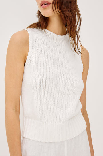 Bondi Sleeveless Vest in Soft Cotton Knit With Rolled Neckline, Relaxed Fit, and Ribbed Hem in White Colorway - Upper Body Front Close Up View Featured on Model