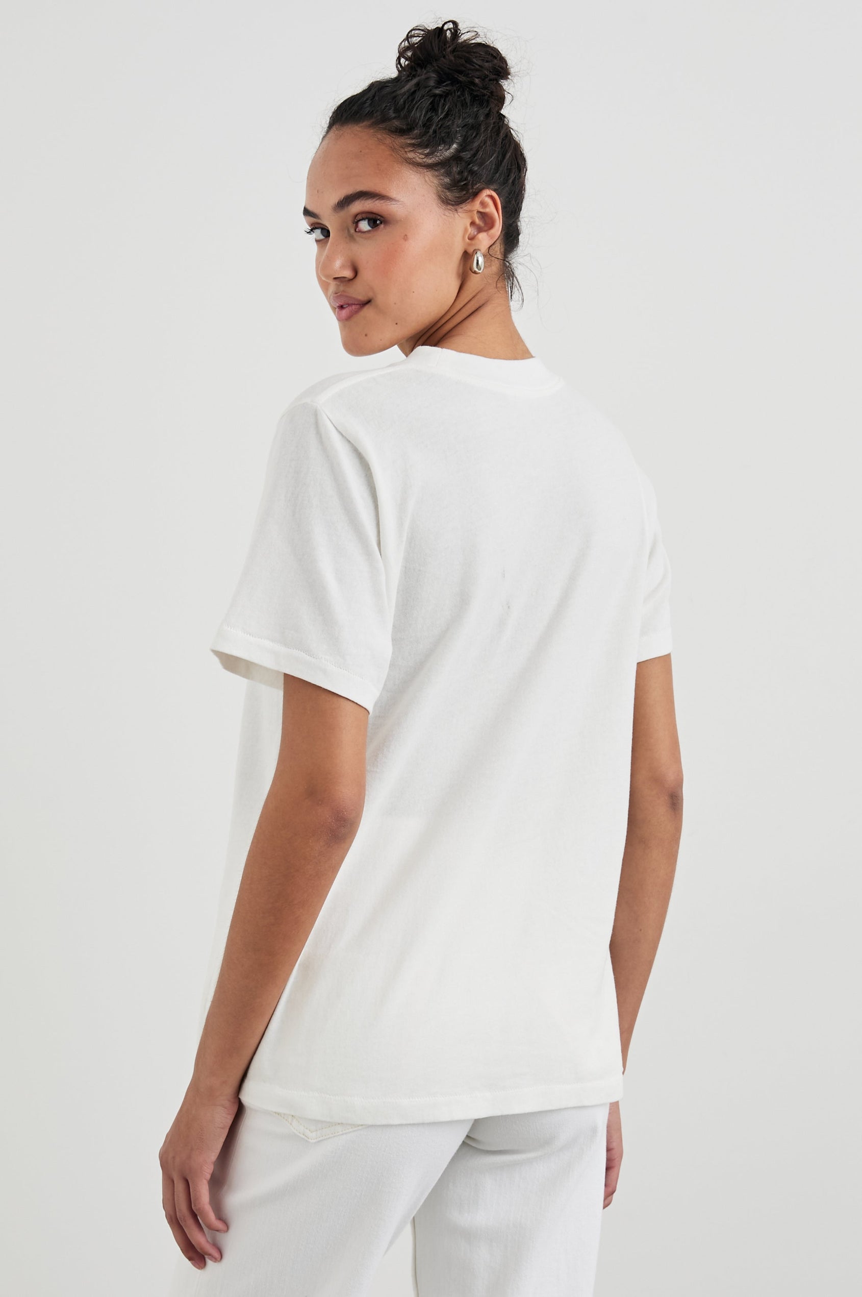 Boyfriend T-Shirt with a Crew Neck, Amsterdam images, and the text, Rails Amsterdam in Rails Amsterdam Colorway, with image and text in blues, browns, greens, on White - Back View Featured on Model