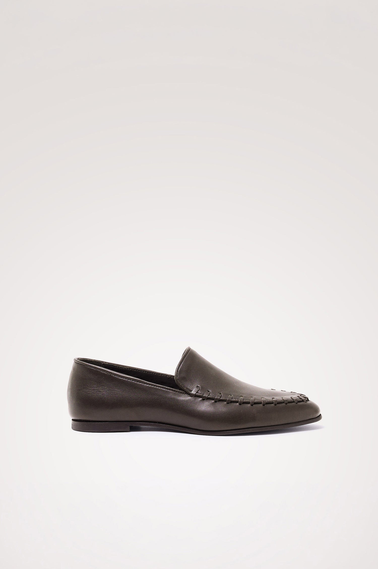 Braga Loafer in Full-Grain Leather With Whipstitch Trim, Narrow Vamp, and Low Heel in Dark Brown Colorway - Side Product View Featured