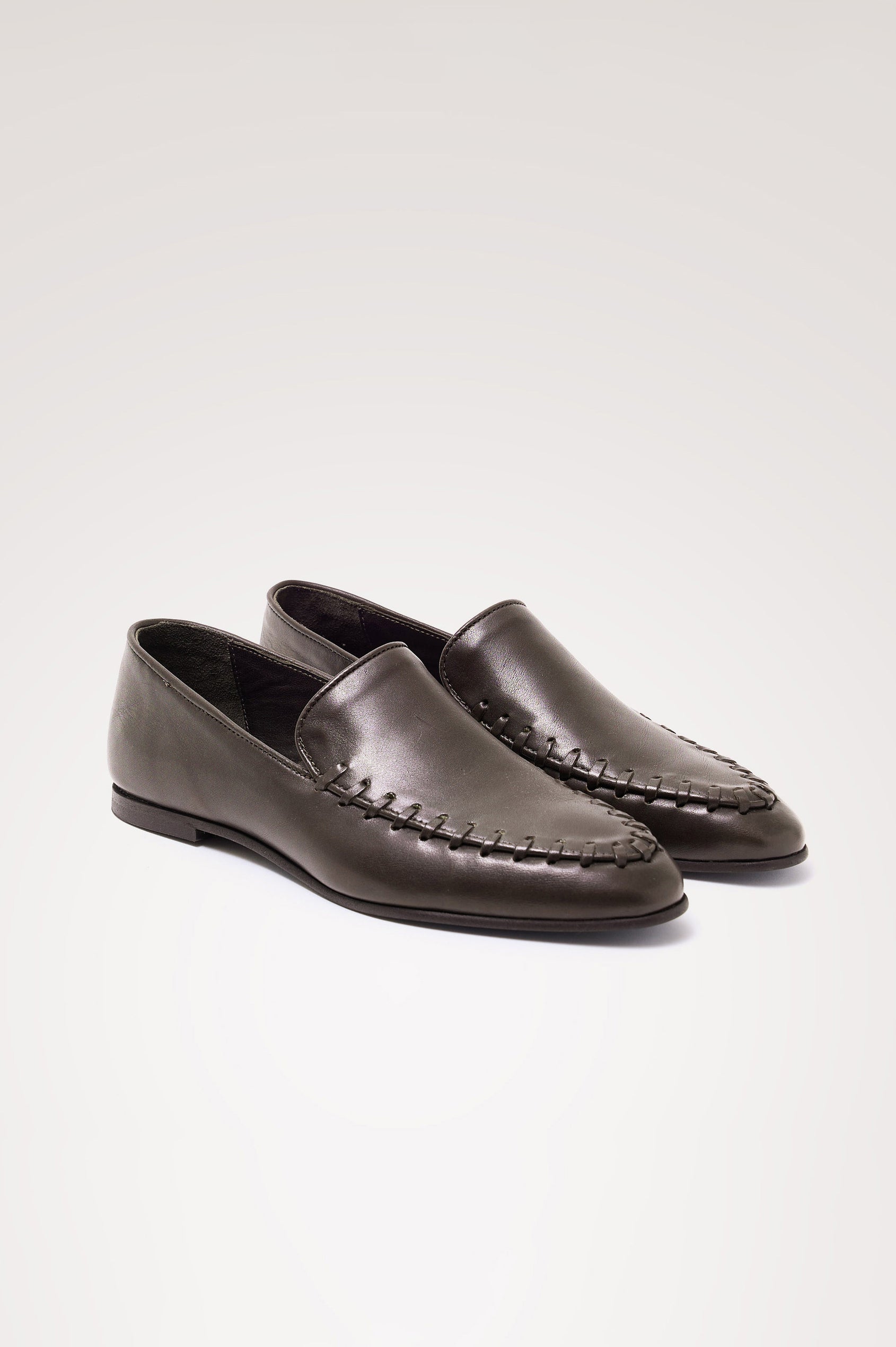 Braga Loafer in Full-Grain Leather With Whipstitch Trim, Narrow Vamp, and Low Heel in Dark Brown Colorway - Side Product View Featured