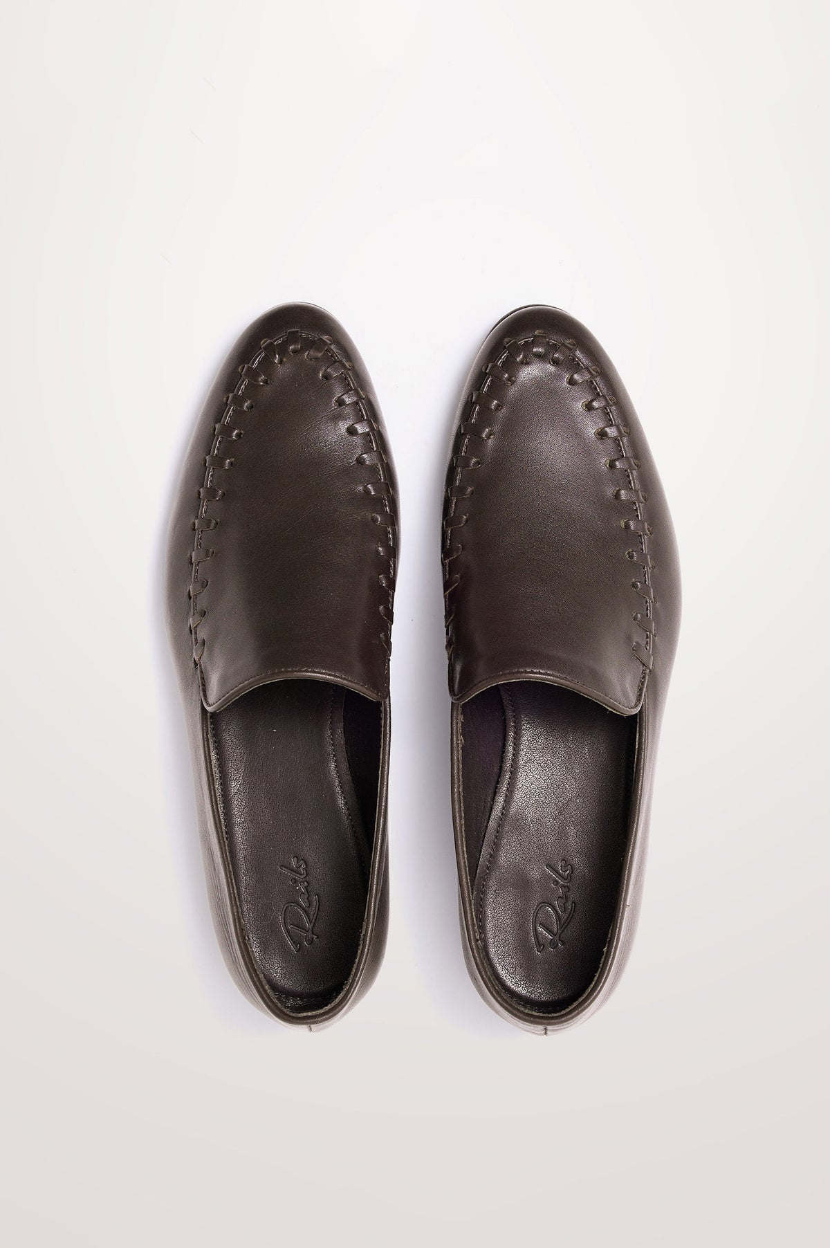 Braga Loafer in Full-Grain Leather With Whipstitch Trim, Narrow Vamp, and Low Heel in Dark Brown Colorway - Top Product View Featured