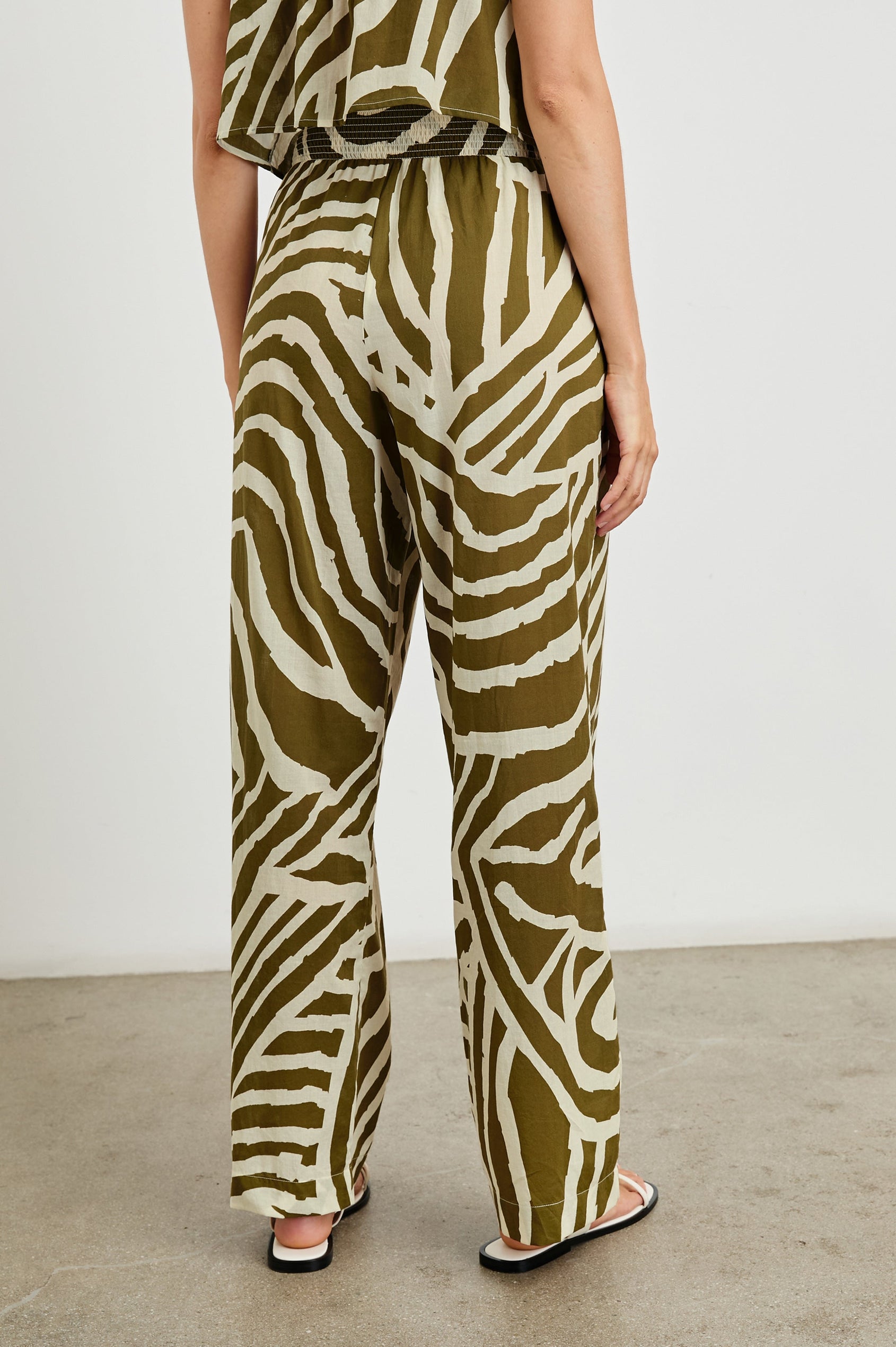 Brendon high-rise Pant with Elastic Waist in Selva Colorway, a Cream and Olive Tiger Stripe - Back View Featured on Model
