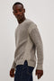Bryce Sweater in Soft Cotton Marl Blend, With Relaxed Fit, Contrast Rib Crewneck, Shoulder, and Cuff Detailing, and Long Sleeves in Taupe Clay Colorway - Upper Body Side View Featured on Model