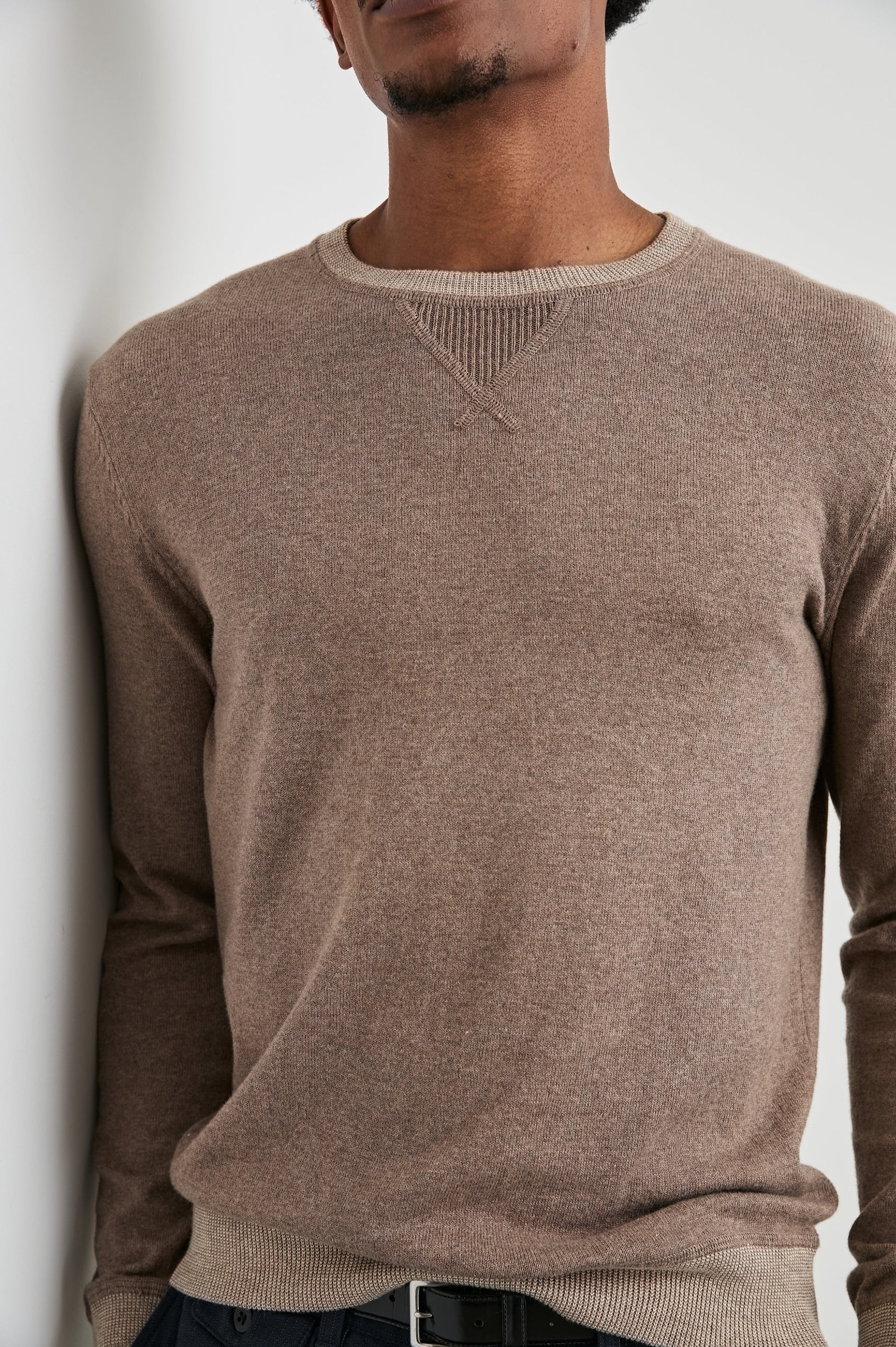 Burns Long-Sleeve Sweater with a Crew Collar and a Lighter Colored Ribbed Trim in Mocha Heather Colorway - Front View Featured on Model