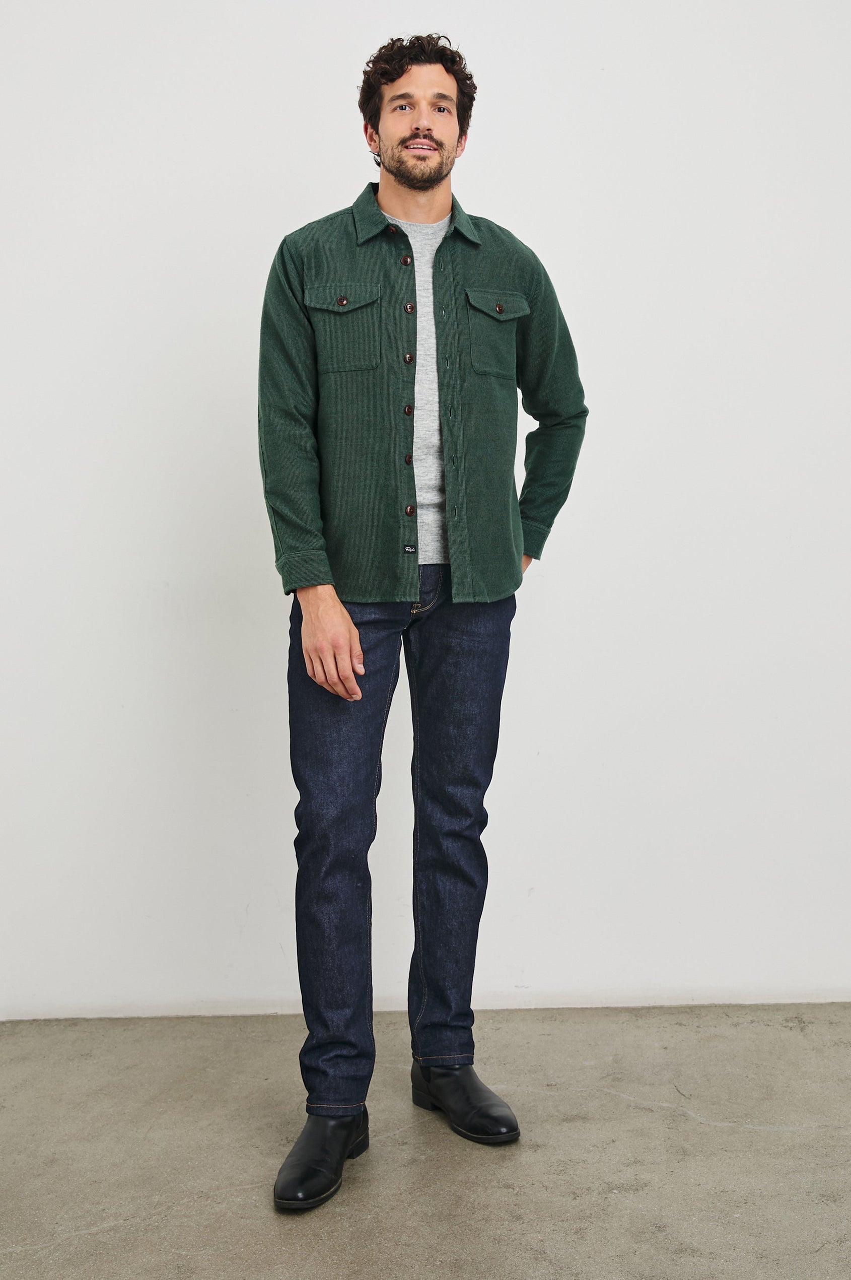 Burr Collared Shirt Jacket with Button Closure, Two Chest Button Flap Pockets and Textured Fabric in Creeping Vine Colorway, a Green - Front Full Body Unbuttoned View Featured on Model