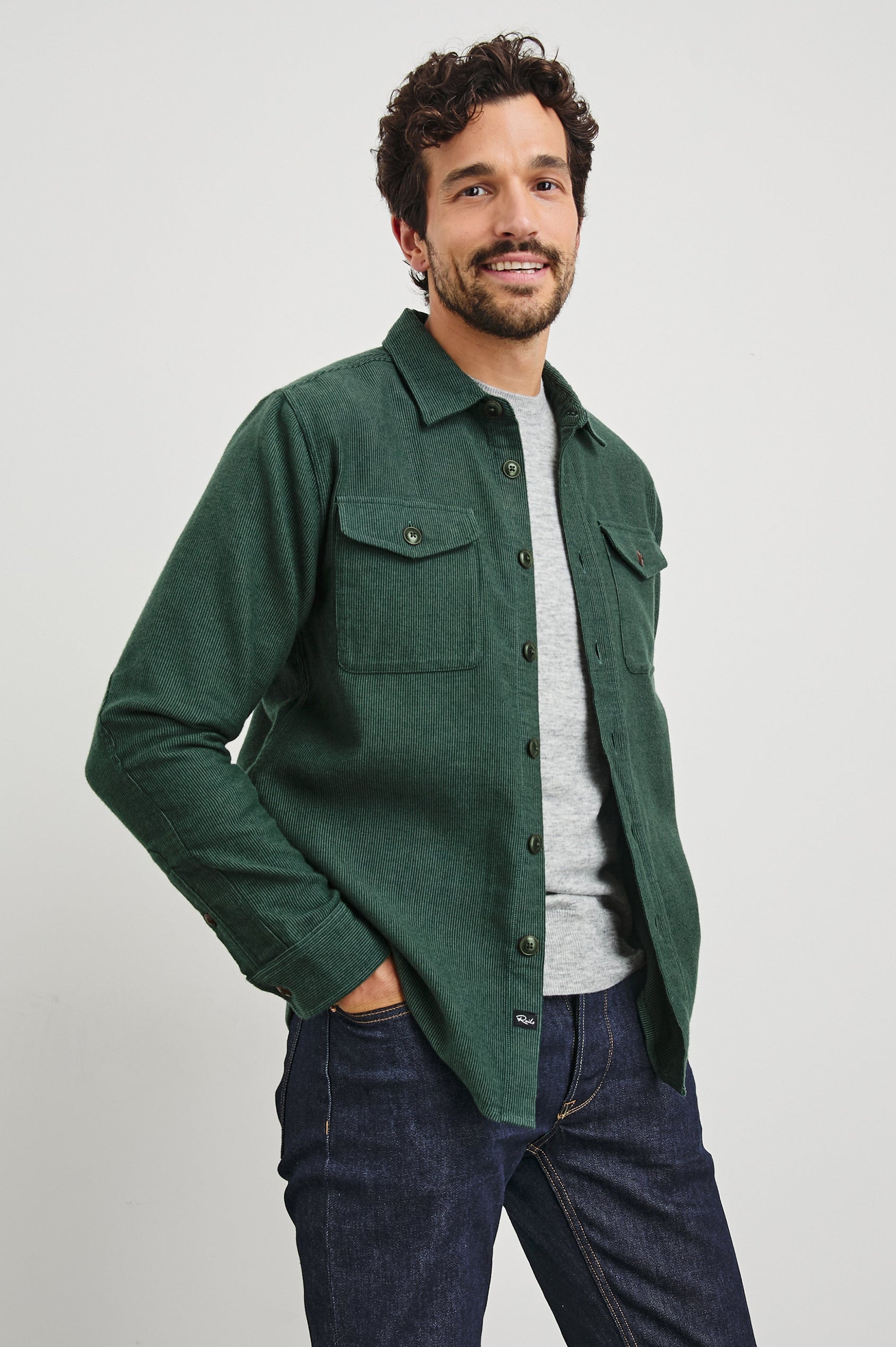 Burr Collared Shirt Jacket with Button Closure, Two Chest Button Flap Pockets and Textured Fabric in Creeping Vine Colorway, a Green - Front Unbuttoned View Featured on Model