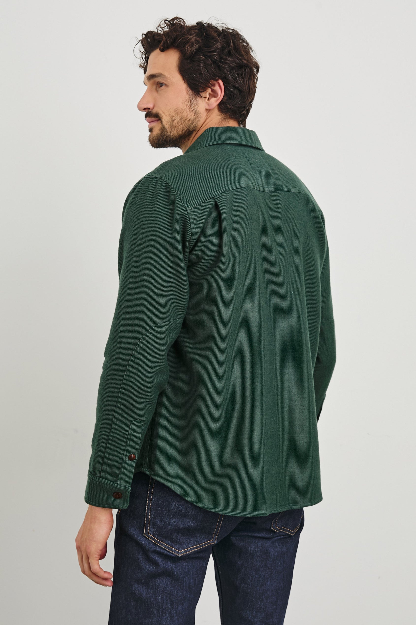 Burr Collared Shirt Jacket with Button Closure, Two Chest Button Flap Pockets and Textured Fabric in Creeping Vine Colorway, a Green - Back Unbuttoned View Featured on Model