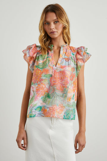Calista Short Sleeve Top with Double Layer Flutter Sleeves, a V Neck with a Placket, a Ruffled Collar, and Light Ruching Along the Yoke in Tropics Colorway, Floral Print in Oranges, Greens and Blue - Front View Featured on Model 