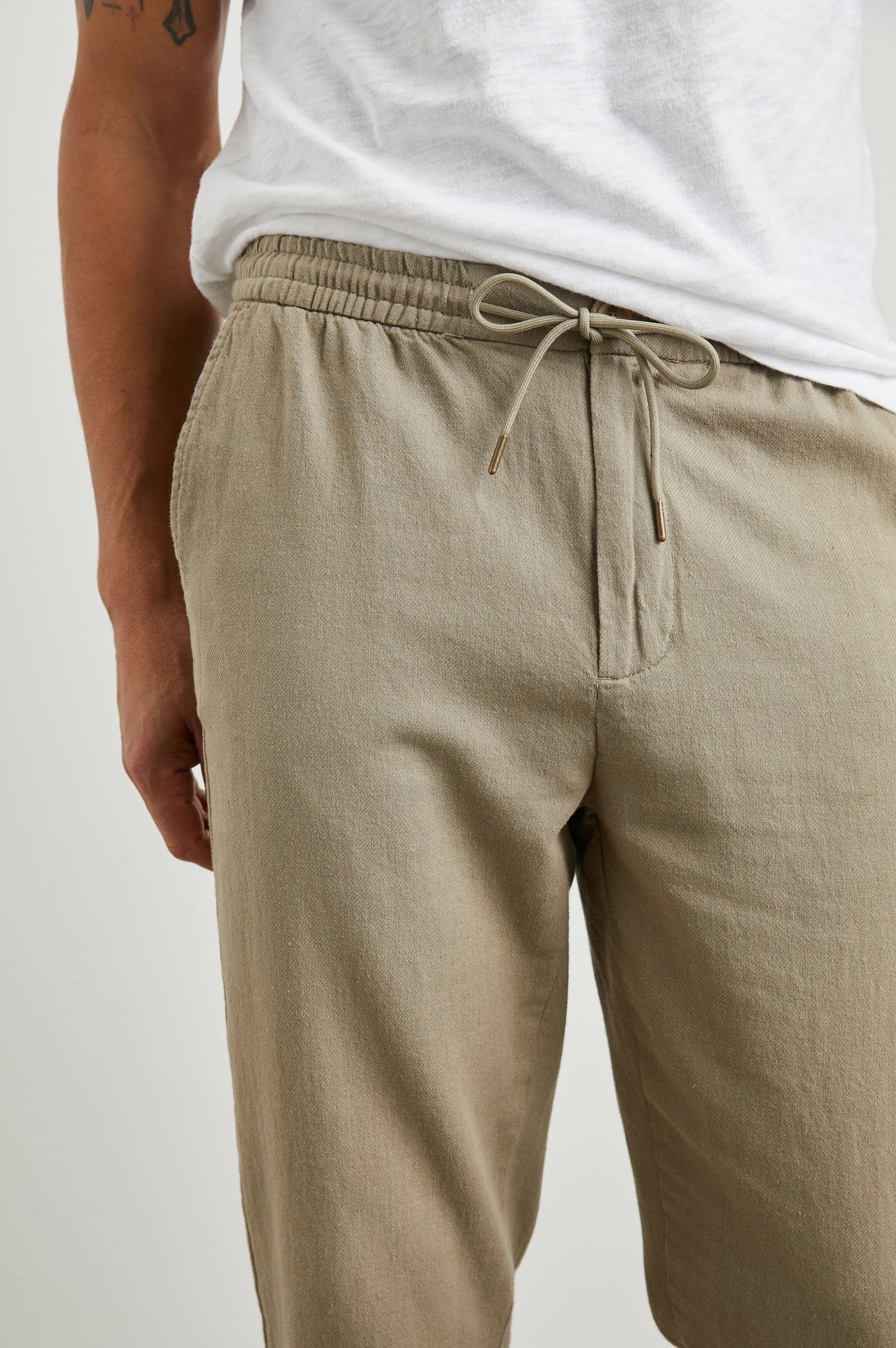 Callum Pants with a Drawstring Waist, Two Front Pockets and a Back Patch Pocket in Barley Colorway - Front View Featured on Model