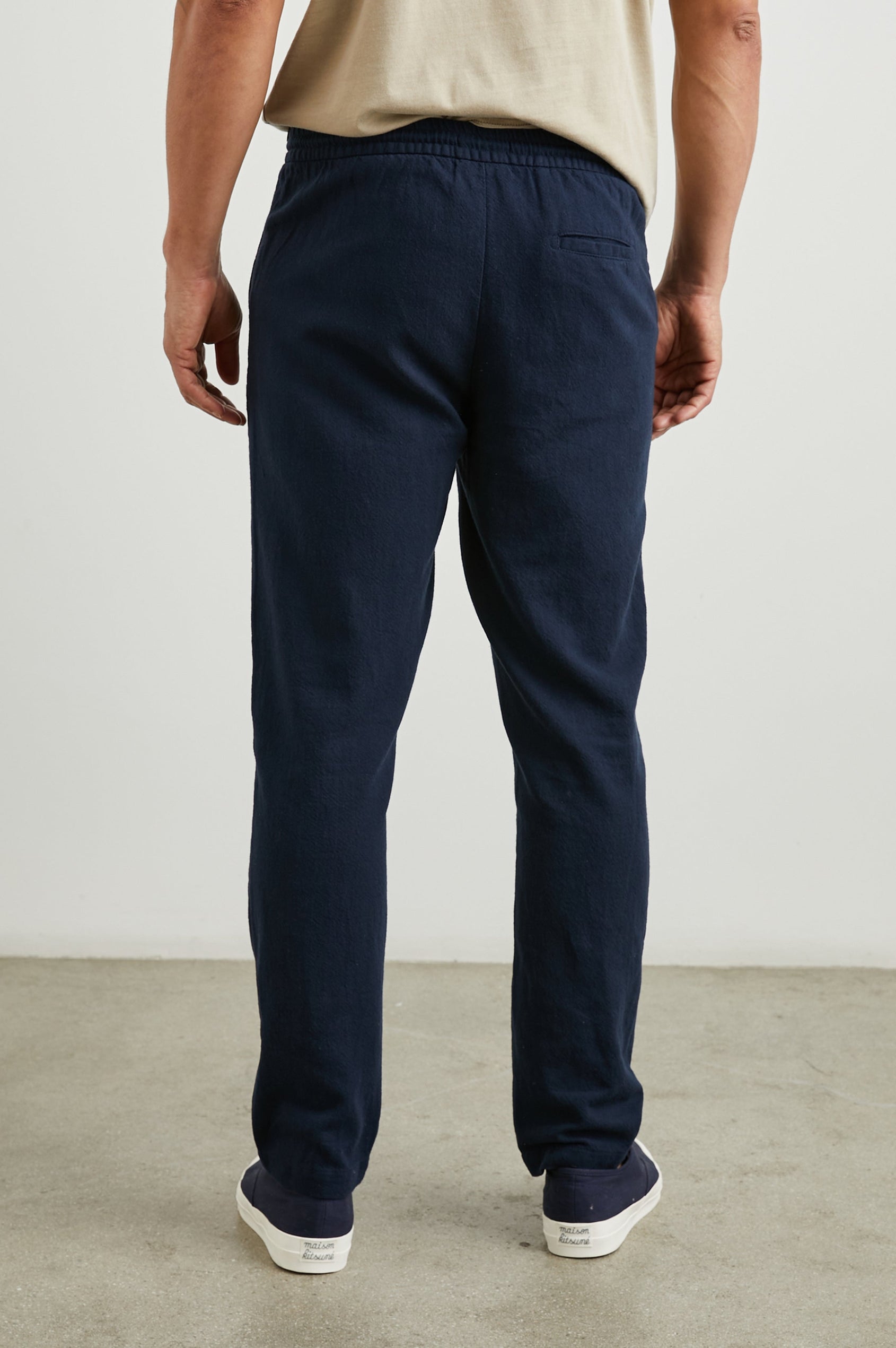 Callum Pants with a Drawstring Waist, Two Front Pockets and a Back Patch Pocket in Deep Meridian Colorway - Back View Featured on Model