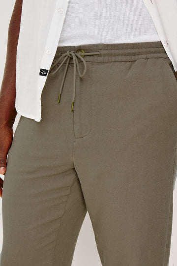 Callum Tapered Straight Leg Pant in Linen Twill With Adjustable Drawstring Waistband Ties in Fallen Rock Colorway - Lower Body Front Cloes Up View Featured on Model
