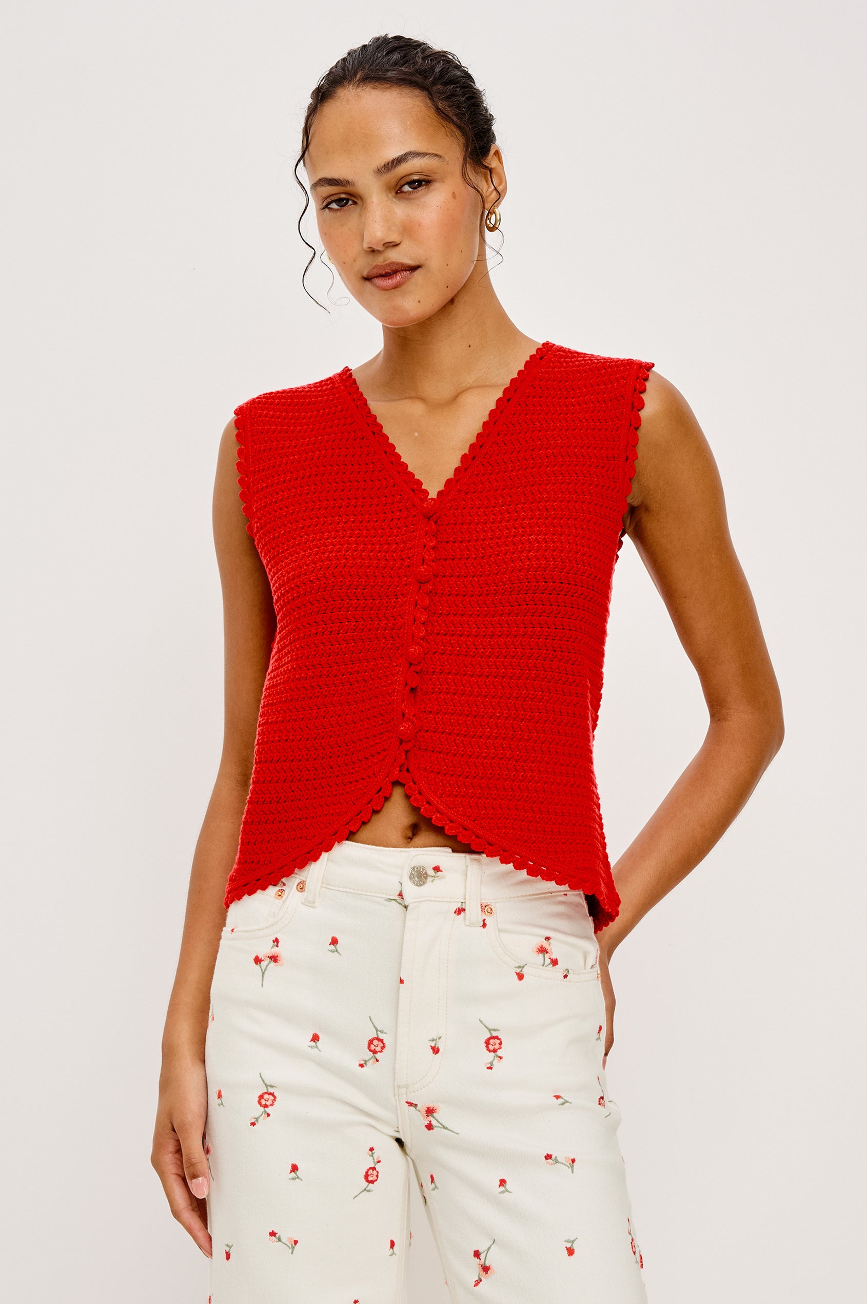 Calypso Knit Sleeveless Vest Top With Front Buttons and Relaxed Fit in Scarlet Colorway - Upper Body Front View Featured on Model