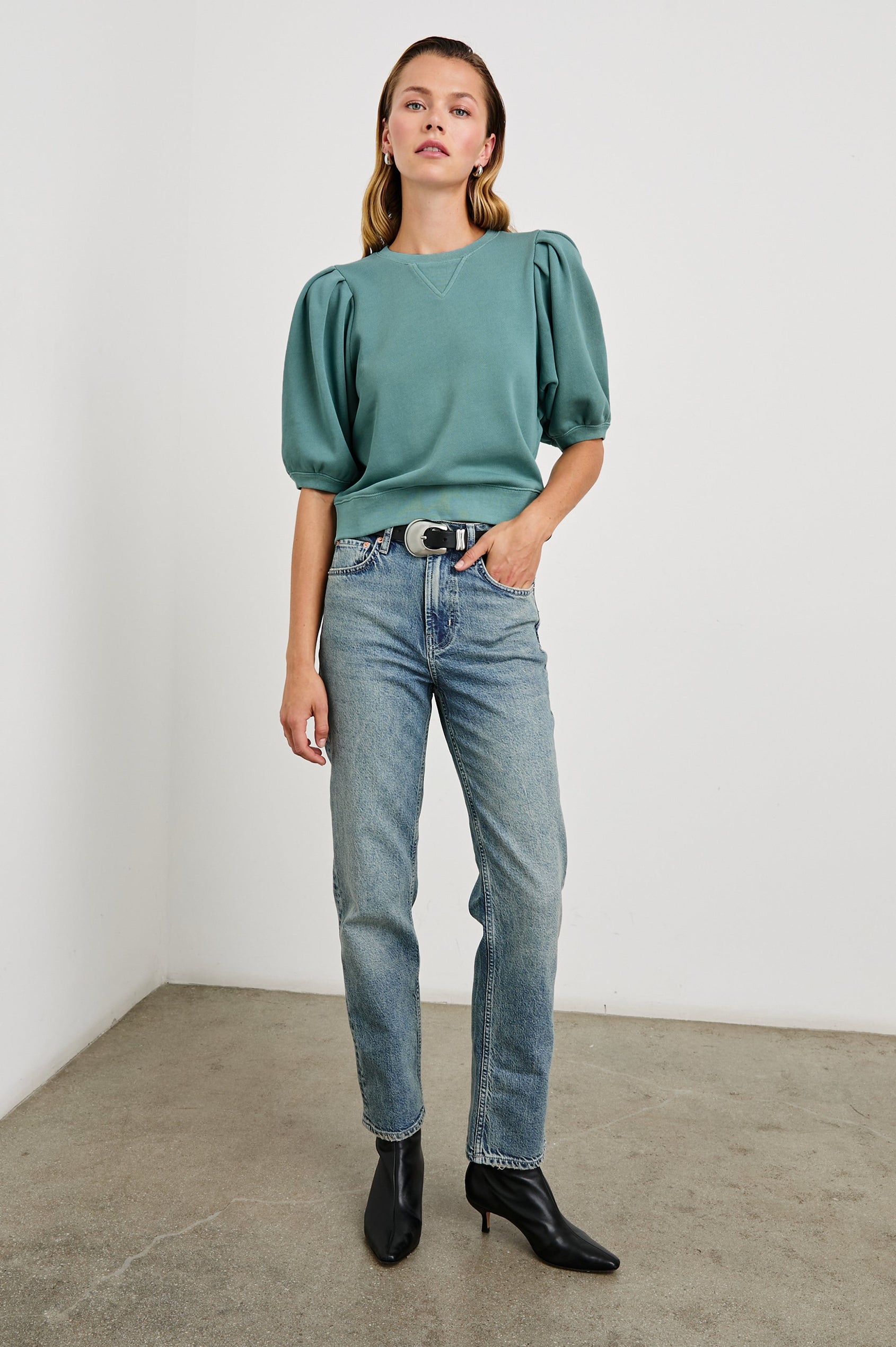 Camy Sweatshirt with Elbow Length Puff Sleeves and a Crew Neck in Stone Blue Colorway - Front Full Body View Featured on Model 