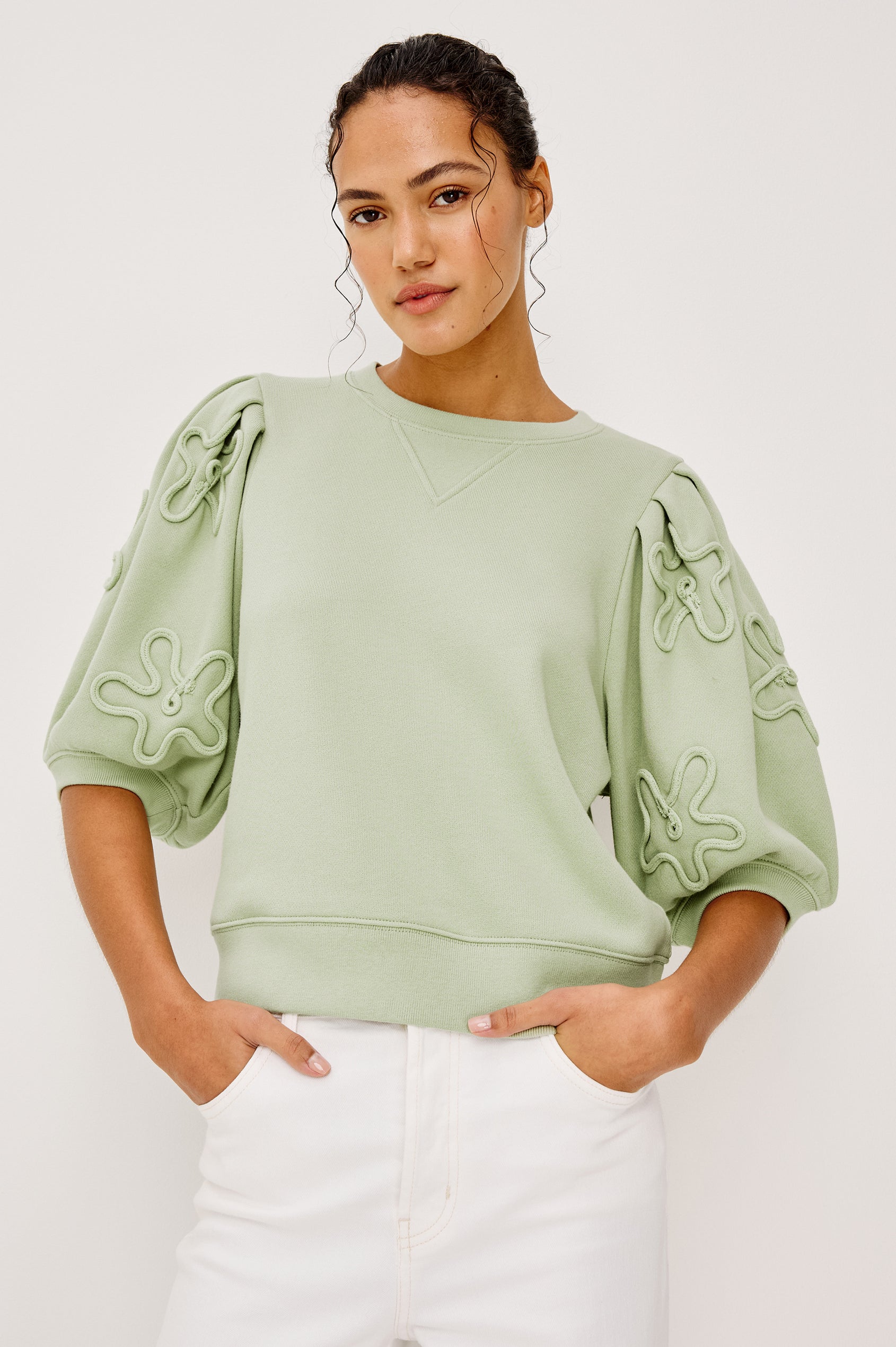 Camy Crewneck Sweatshirt in French Terry With Crew Neckline Soutached Florals and Puff Sleeves in Vintage Sage Colorway - Upper Body Front View Featured on Model