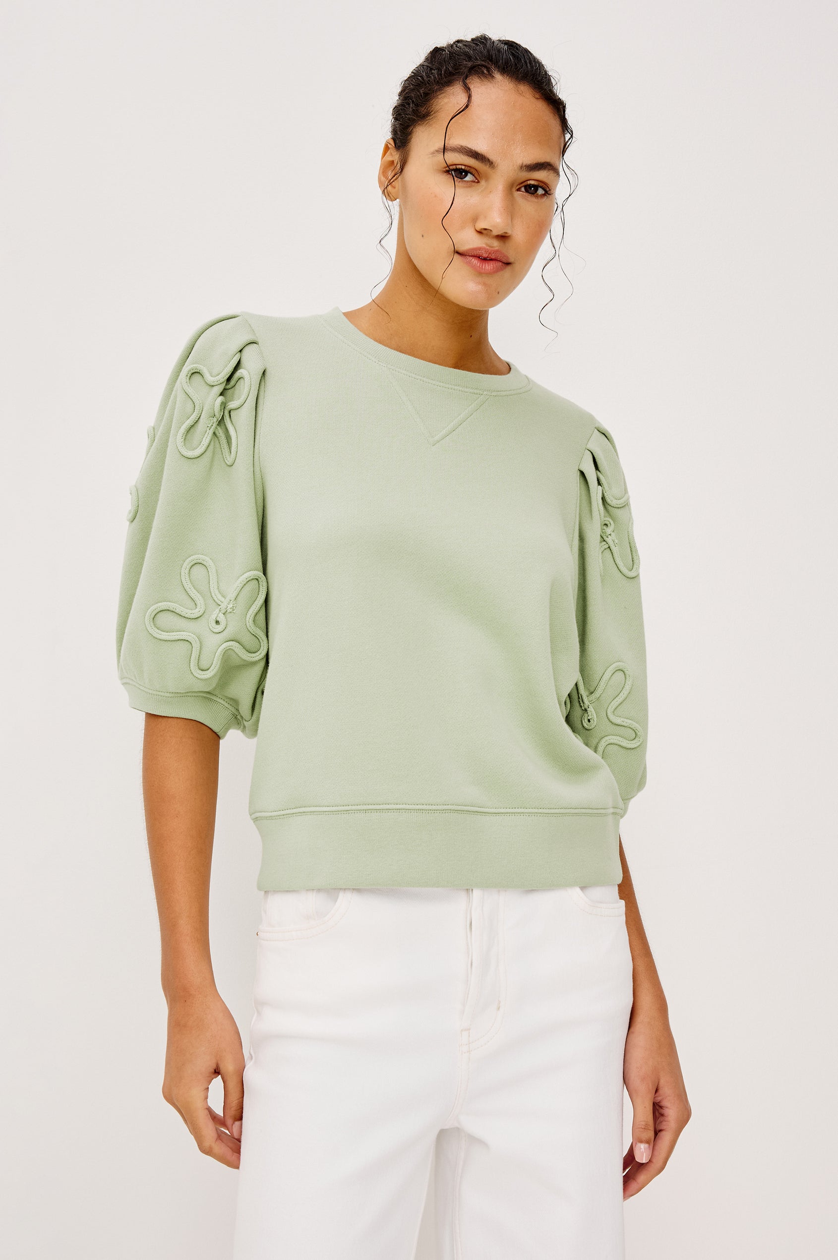 Camy Crewneck Sweatshirt in French Terry With Crew Neckline Soutached Florals and Puff Sleeves in Vintage Sage Colorway - Upper Body Front View Featured on Model