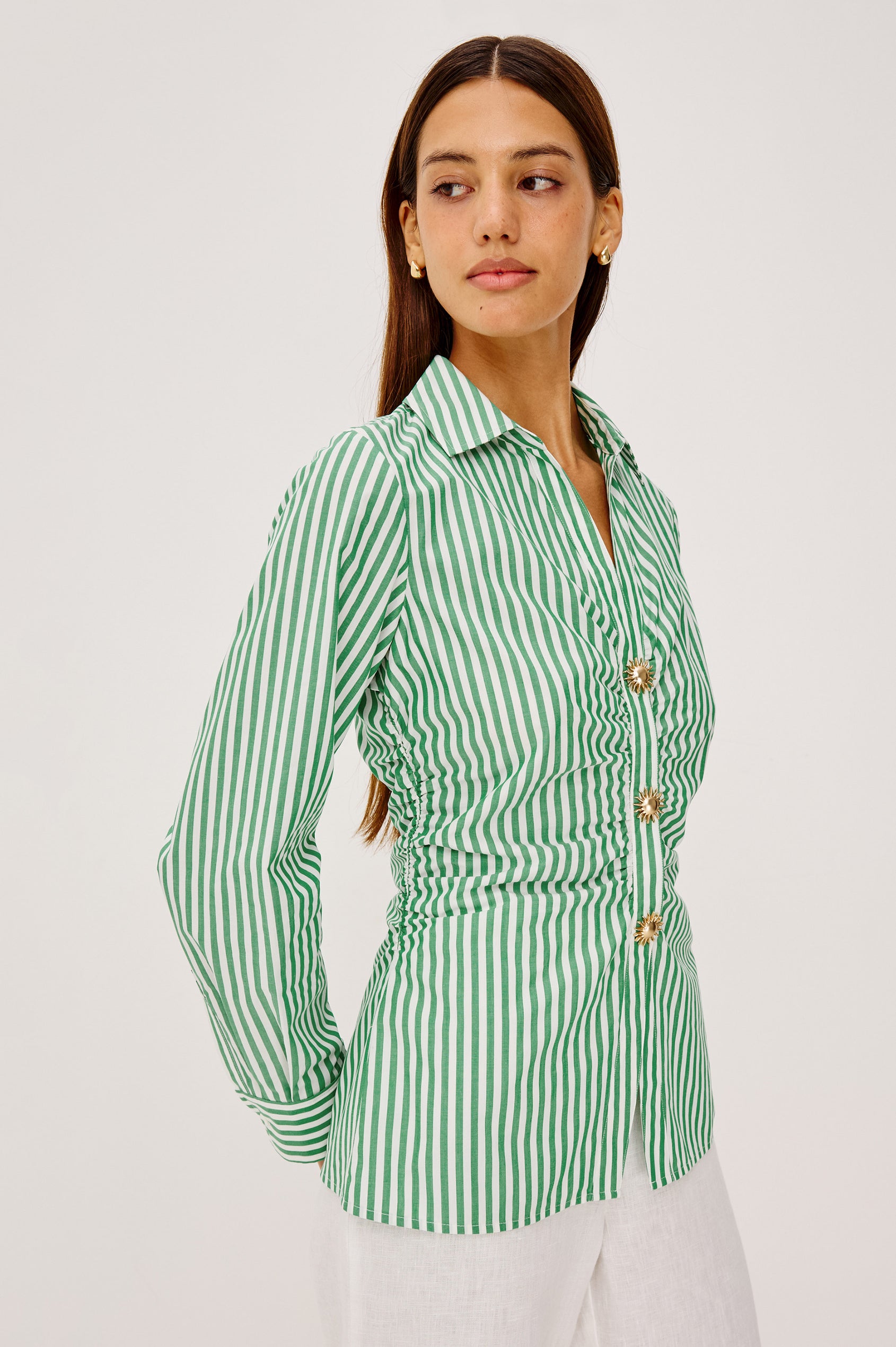 Caralyn Button-Up Shirt in Cotton Poplin With Collar, Long Sleeves, Gathered Waist, and Molded Sun Front Buttons in Emerald Stripe Colorway - Full Body Front View Featured on Model