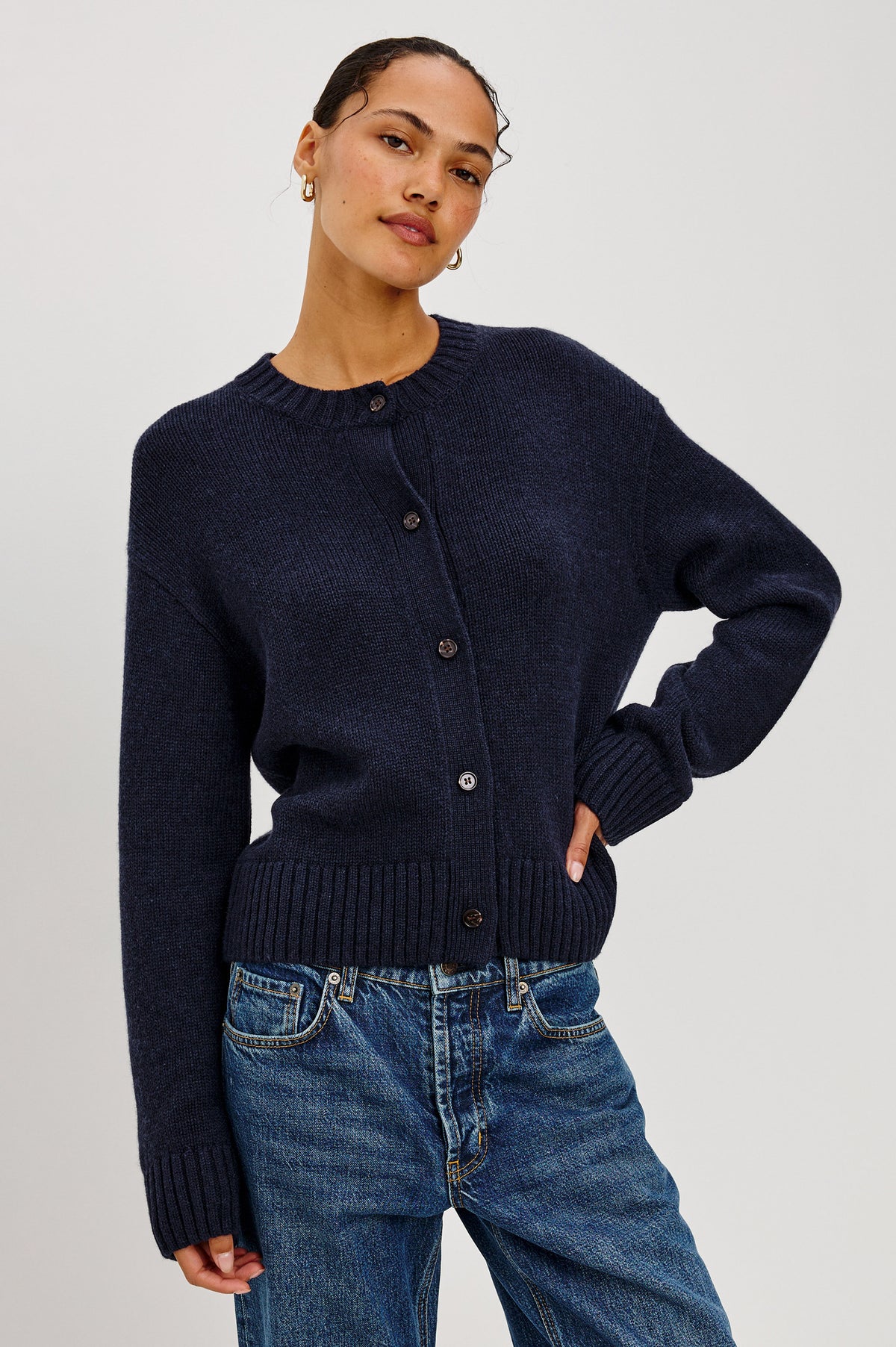 Carre Cardigan in Wool-Cashmere Blend With Relaxed Slightly Boxy Fit, Crew Neckline, Front Buttons, Long Sleeves, and Chunky Rib Trim in Navy Colorway - Upper Body Front View Featured on Model