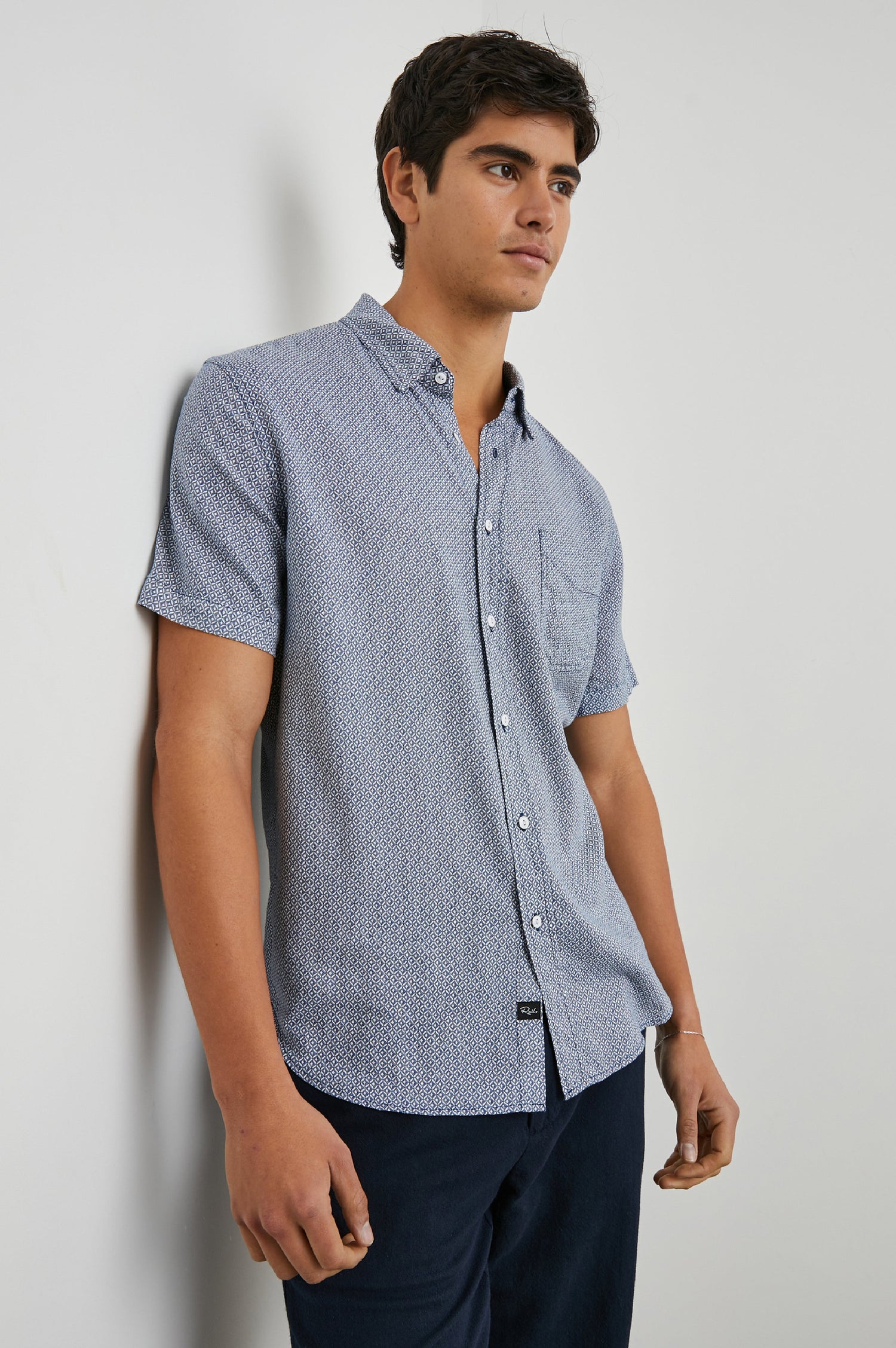 Carson Short Sleeve Button Up with a Chest Patch Pocket in Crown Jewel Sapphire Colorway, with a Small Diamond Pattern - Front View Featured on Model